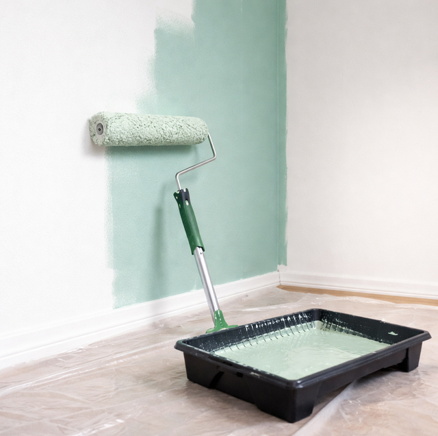 fresh white paint roller leaving streak marks on wall
