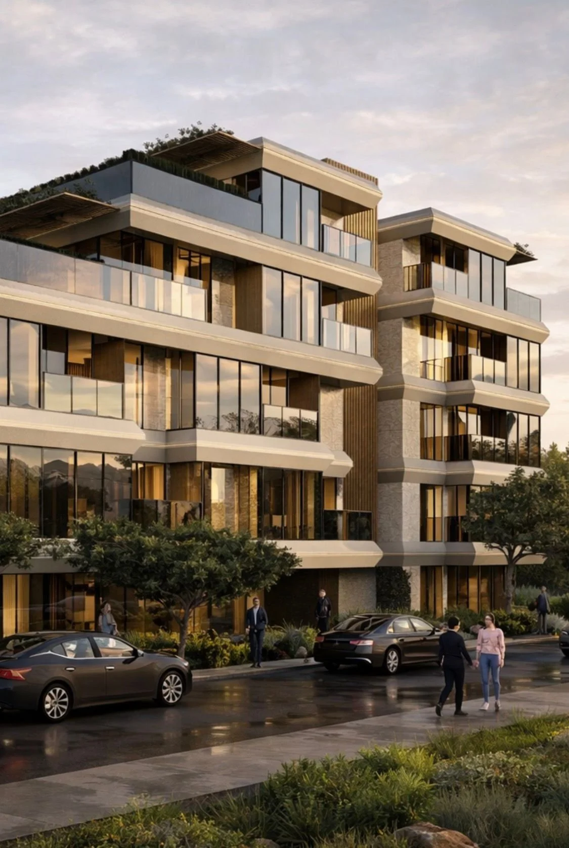 Modern multi-story apartment building with glass balconies and large windows, surrounded by trees, with cars parked in front and people walking on the sidewalk, during sunset.