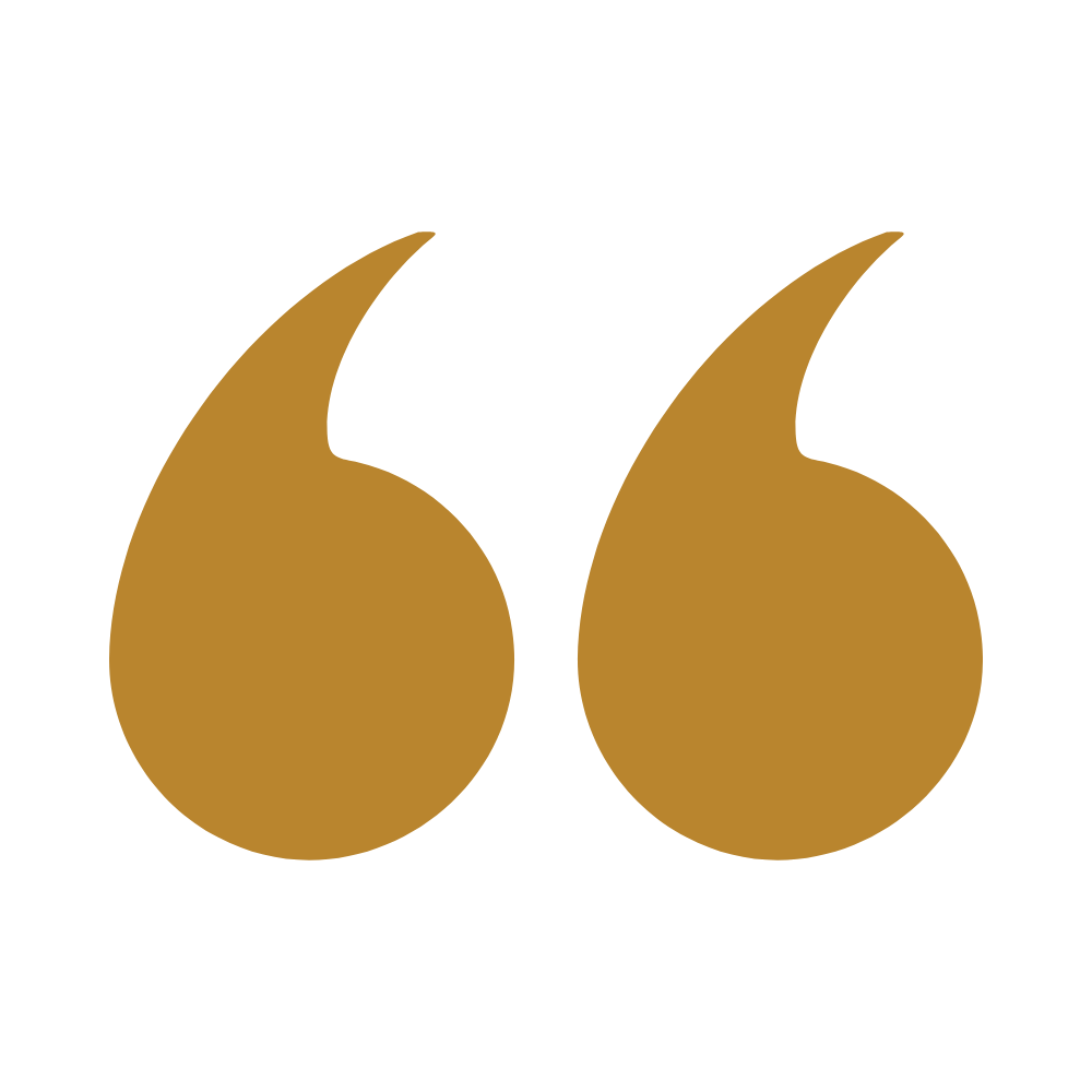 Large gold quotation marks on a black background.