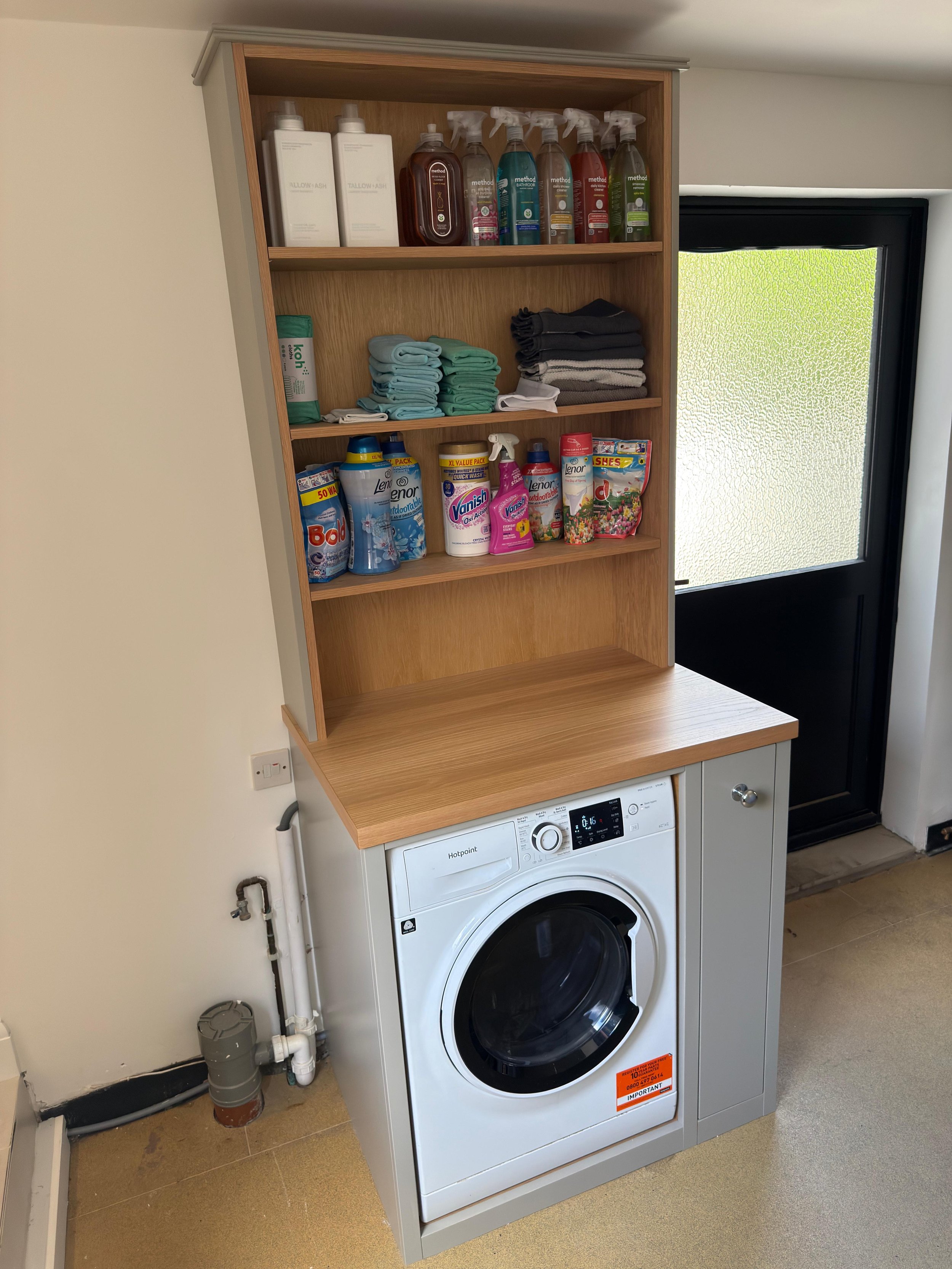 Utility unit - Integrated washing machine unit with pull out access draw and oak shelving