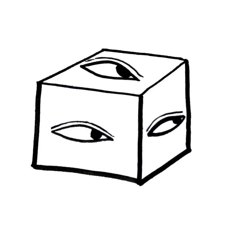 A sketch of a cube with eyes drawn on each face.
