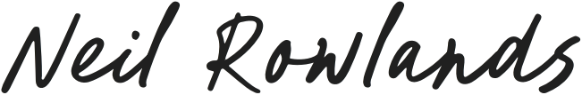 Signature text reading 'Neil Rowlands' in cursive style.