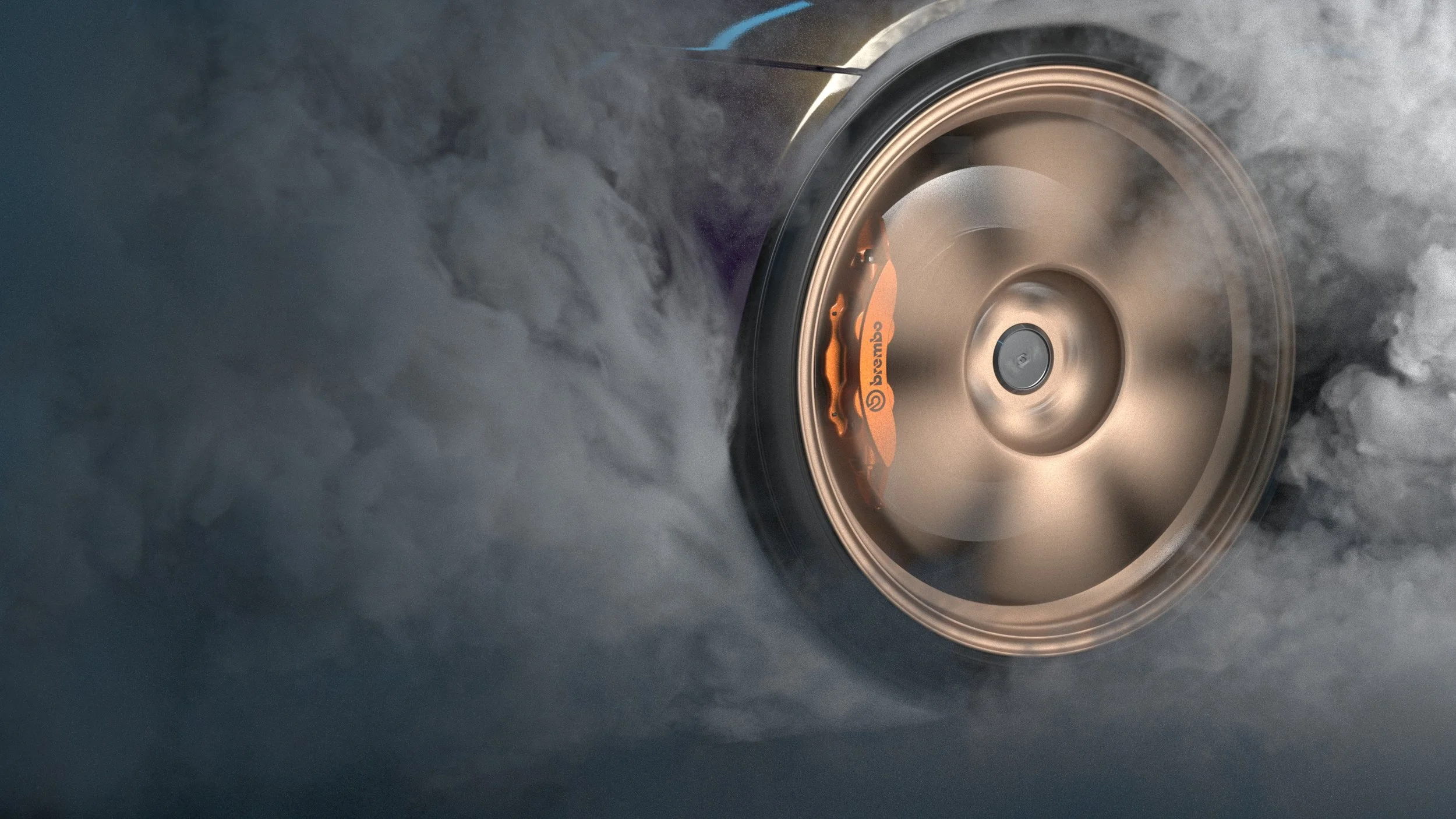 Close-up of a car wheel performing a burnout.
