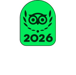 Green badge with an owl's face, laurel leaves, and the year 2026.