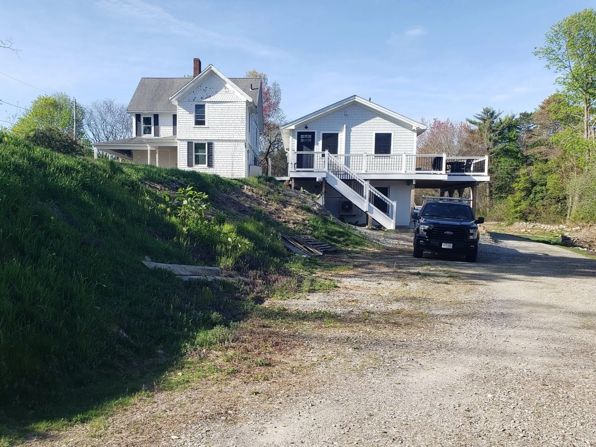 Completed ADU with the main house to the side