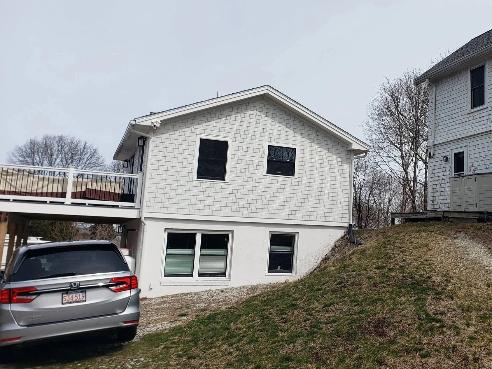 Completed ADU with the main house to the side