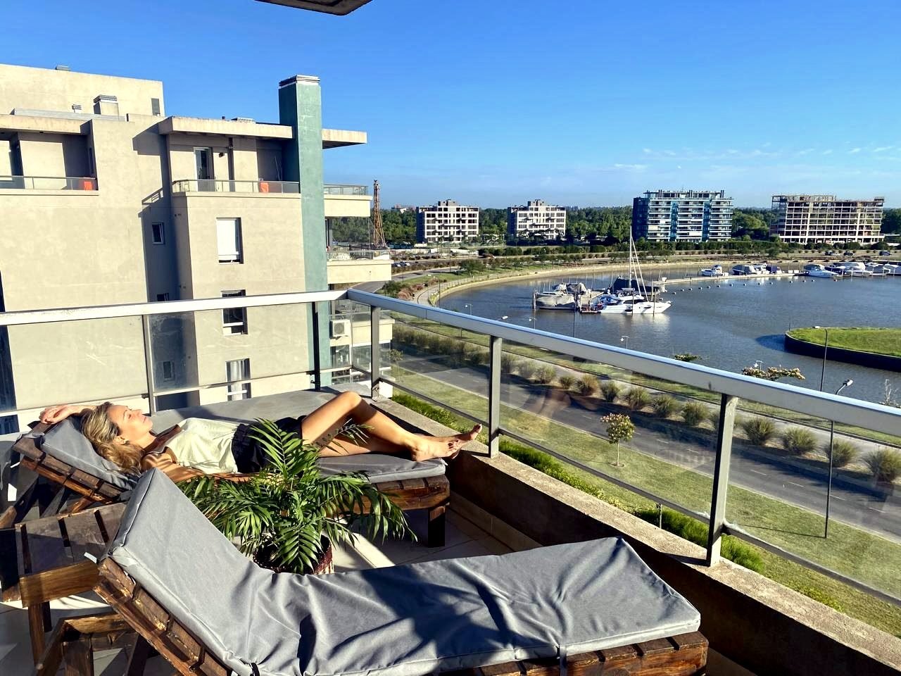 Waterfront balcony overlooking the river at Qbay Yacht, Nordelta. Private Terrace. Riverview and BBQ