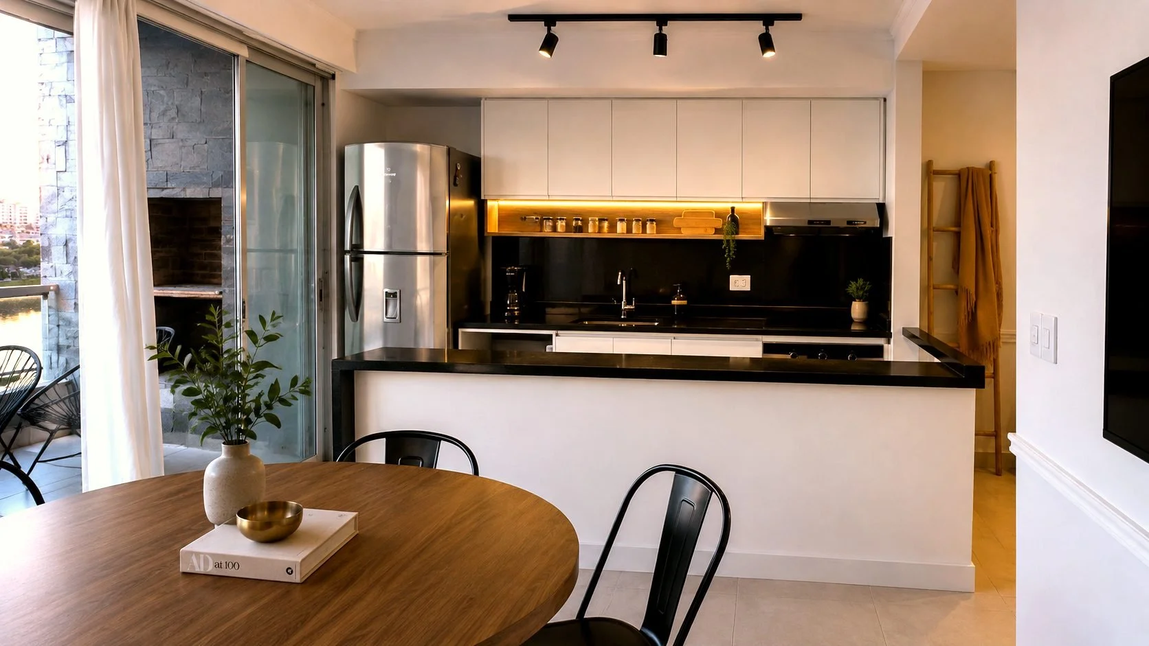 Waterfront balcony overlooking the river at Qbay Yacht, Nordelta. Fully equipped kitchen designed for extended stays