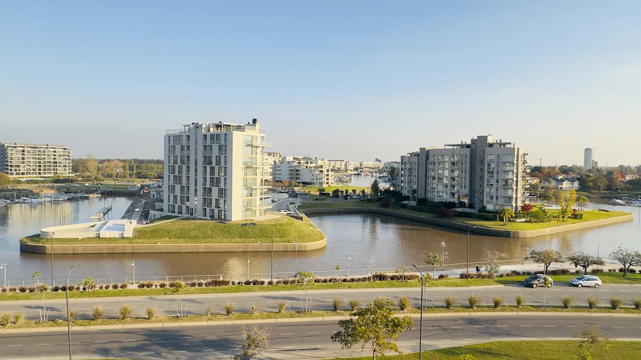 Marina and waterfront promenade near Qbay Yacht.