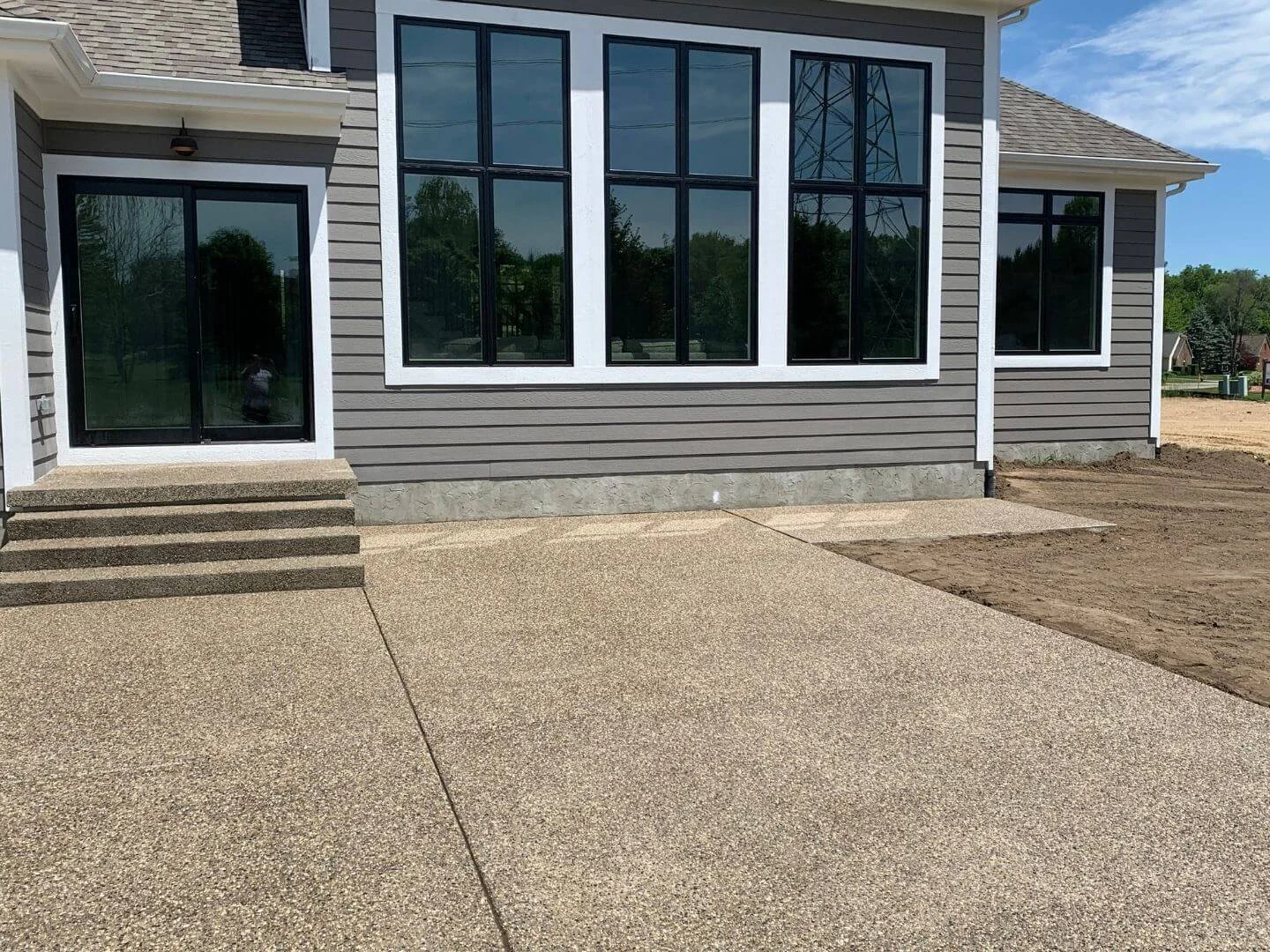 backyard exposed Aggregate concrete patio.jpg