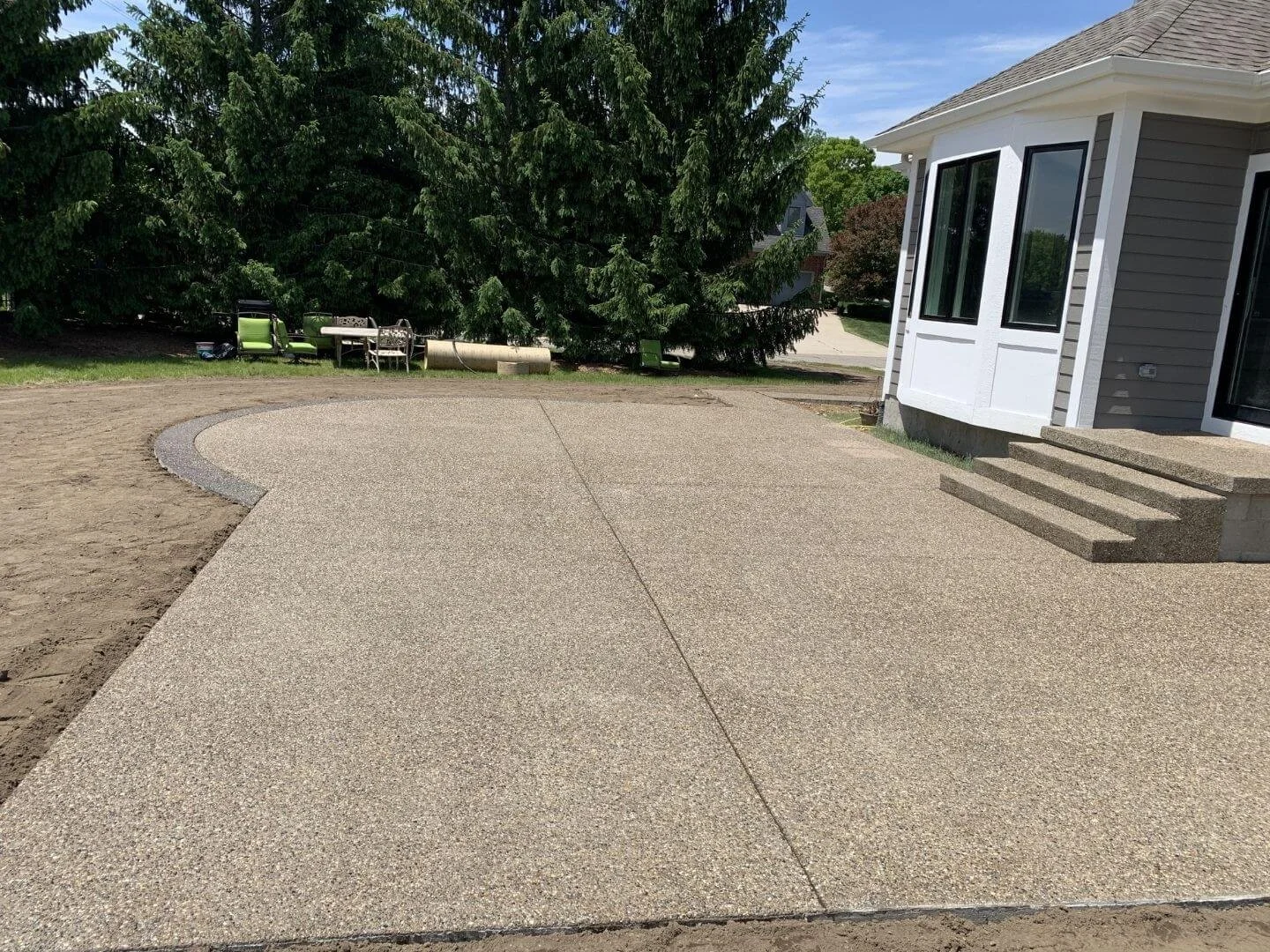 full backyard patio with exposed aggregate.jpg