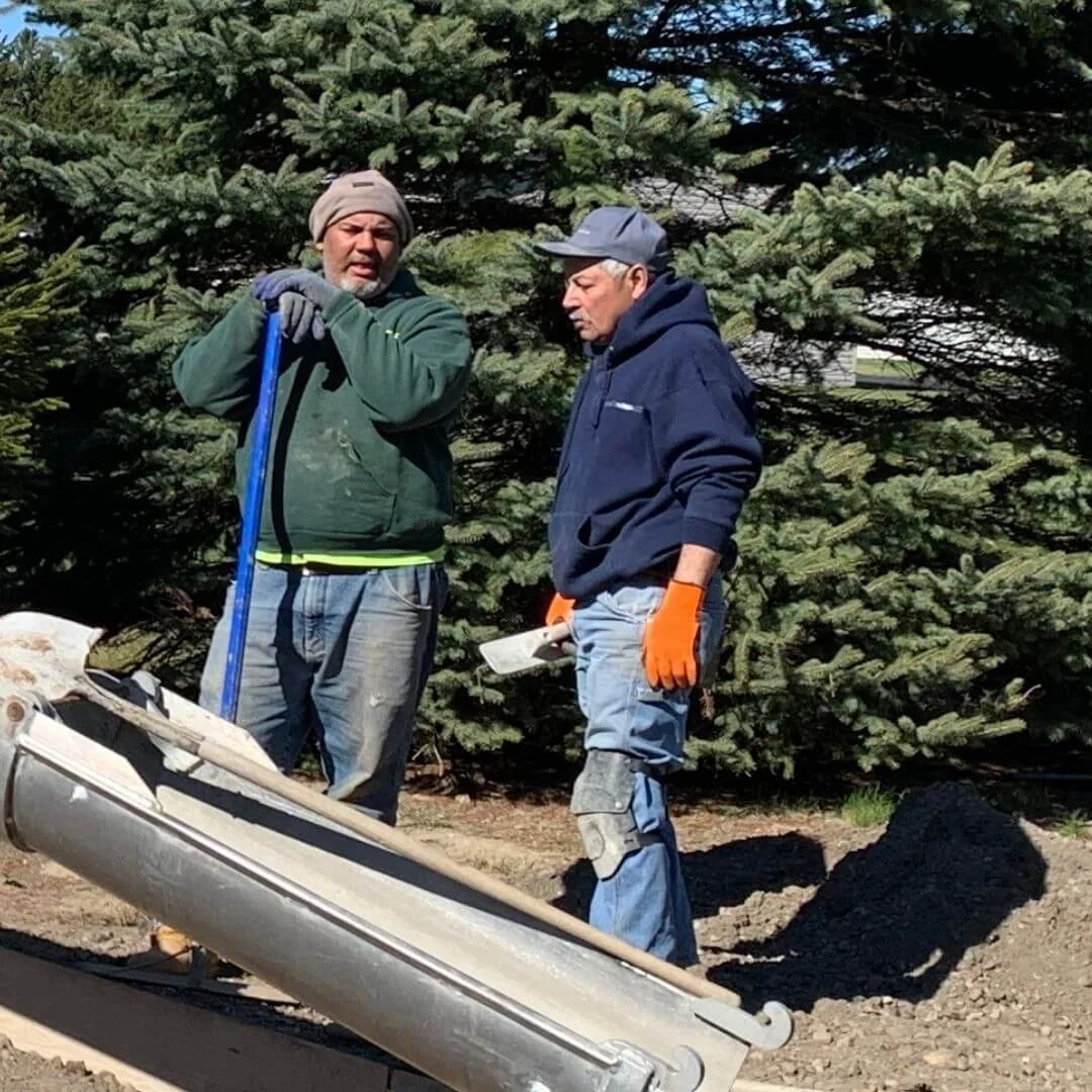 two men talking about concrete project