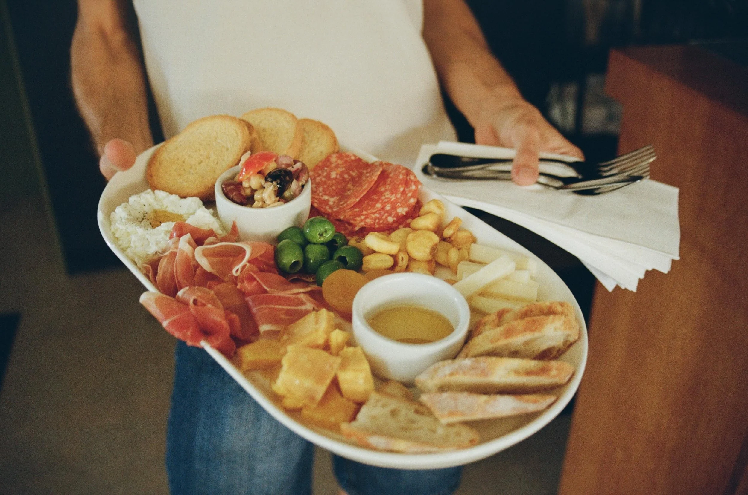 Food is best with wine. And we&rsquo;ve got the best baguettes in the city thanks to Nougatine Bakery. 

Our favorites: a baguette and butter, the Jamon Buerre (ham, cornichon, butter, and salt), a cheese plate with rotating accoutrements , or a char