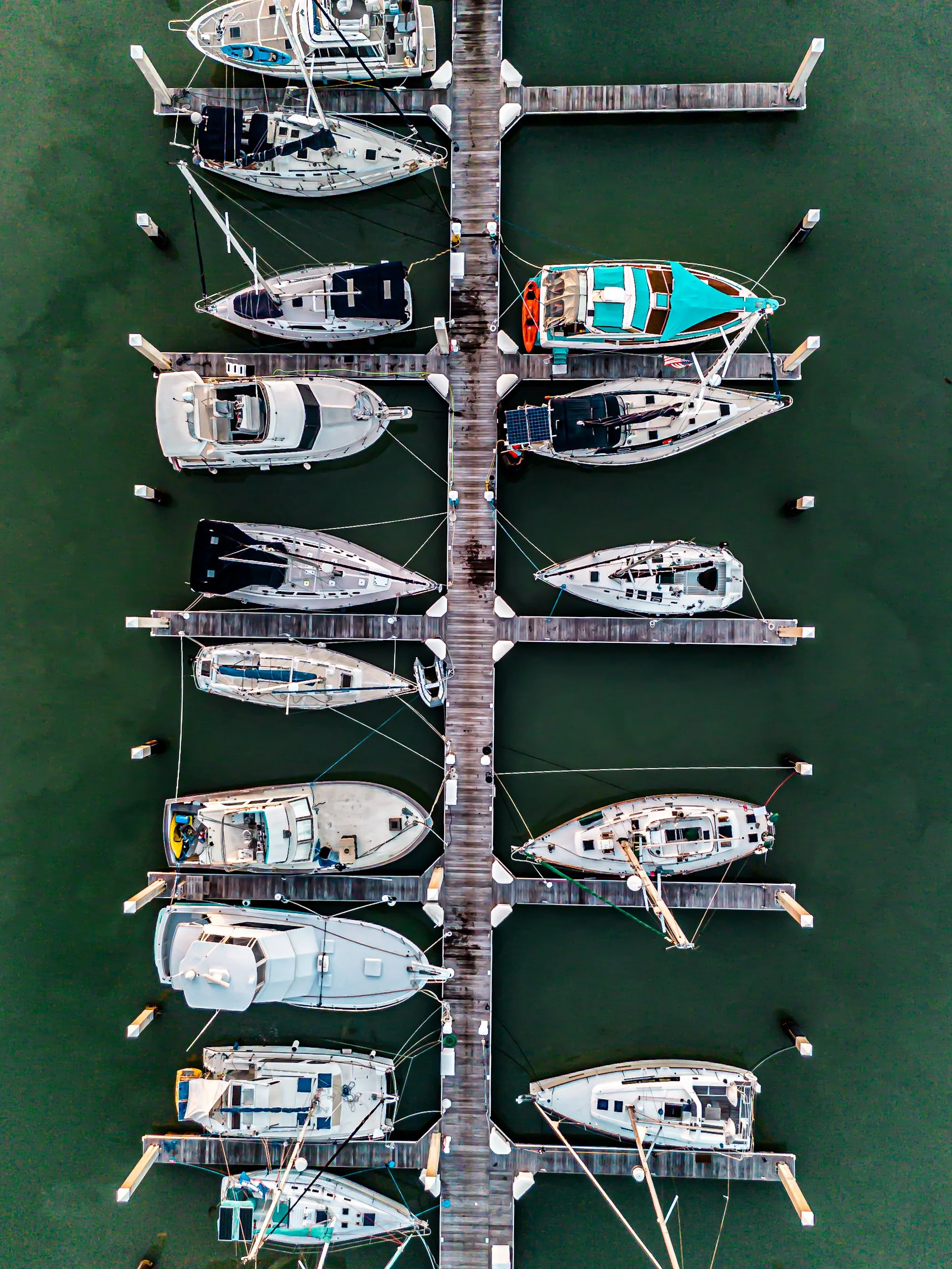 Top-down aerial drone photograph of boats and marina docks in Corpus Christi Bay.