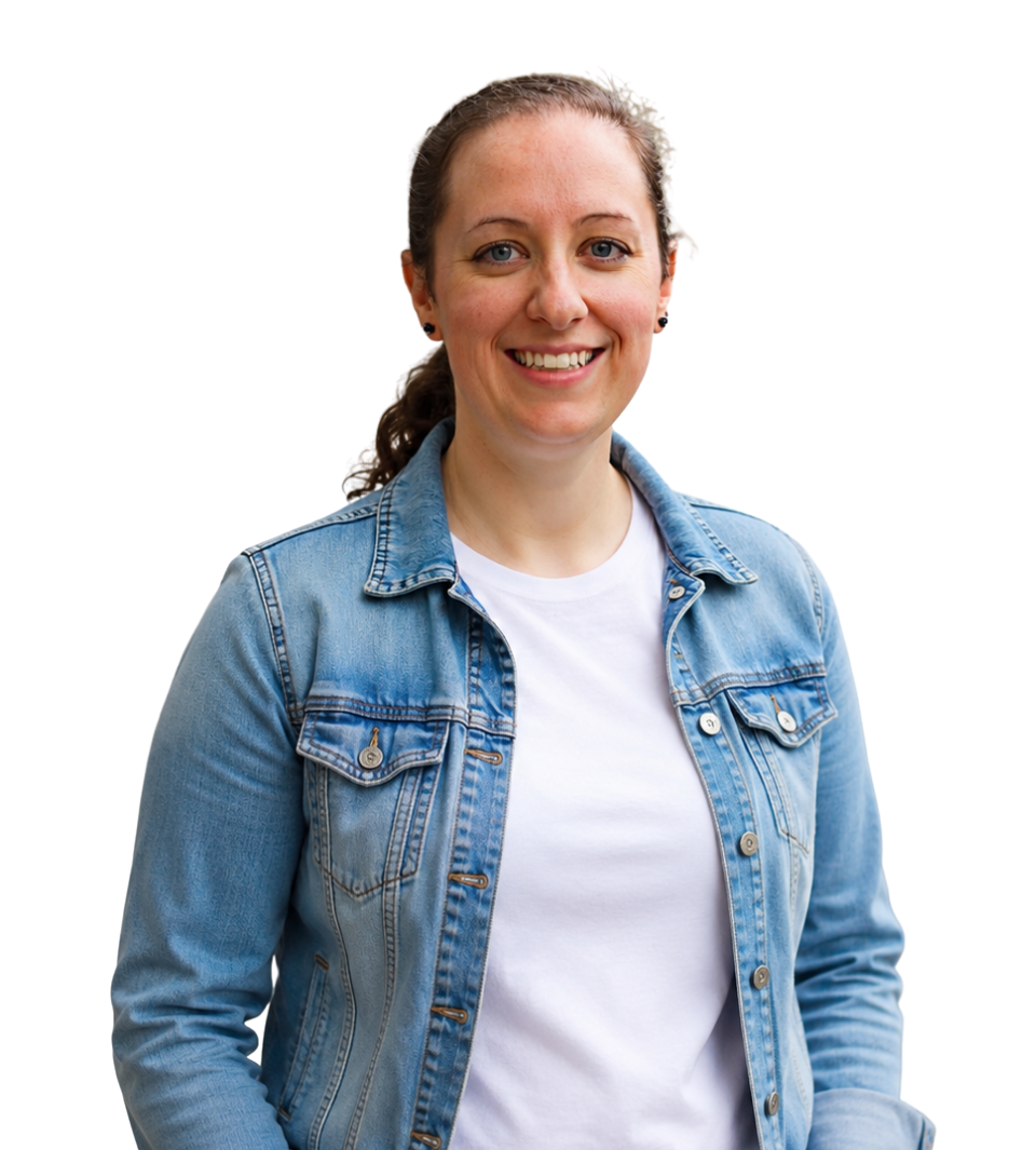 Kat Shaw, YA author and narcissistic abuse advocate, smiling in a denim jacket