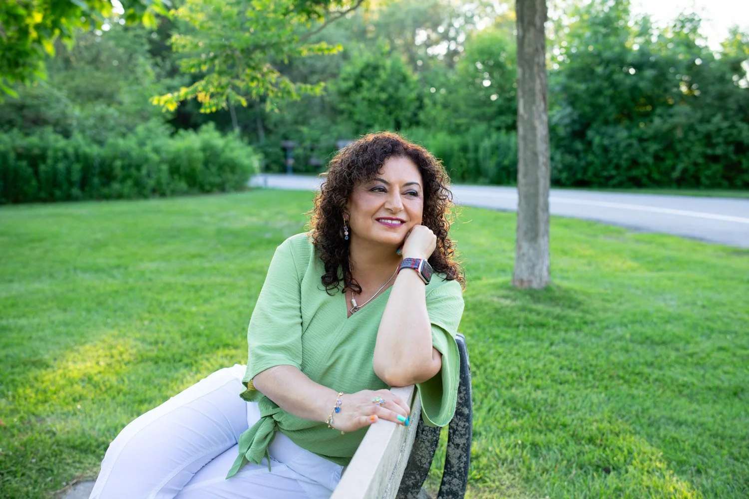 Lucy Shenouda Sitting In Park Reflecting