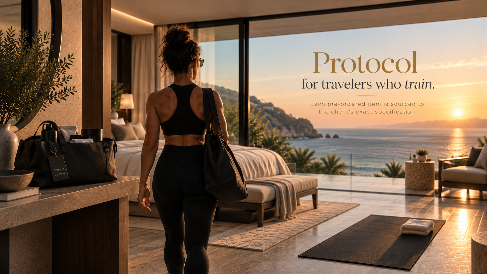 A woman with curly hair in a bun, wearing athletic clothing and sunglasses, stands in a modern hotel room overlooking a sunset over the ocean, with her back to the camera. The room features a bed, nightstand, plants, and gym gear, with a large window revealing palm trees and a scenic coastline.