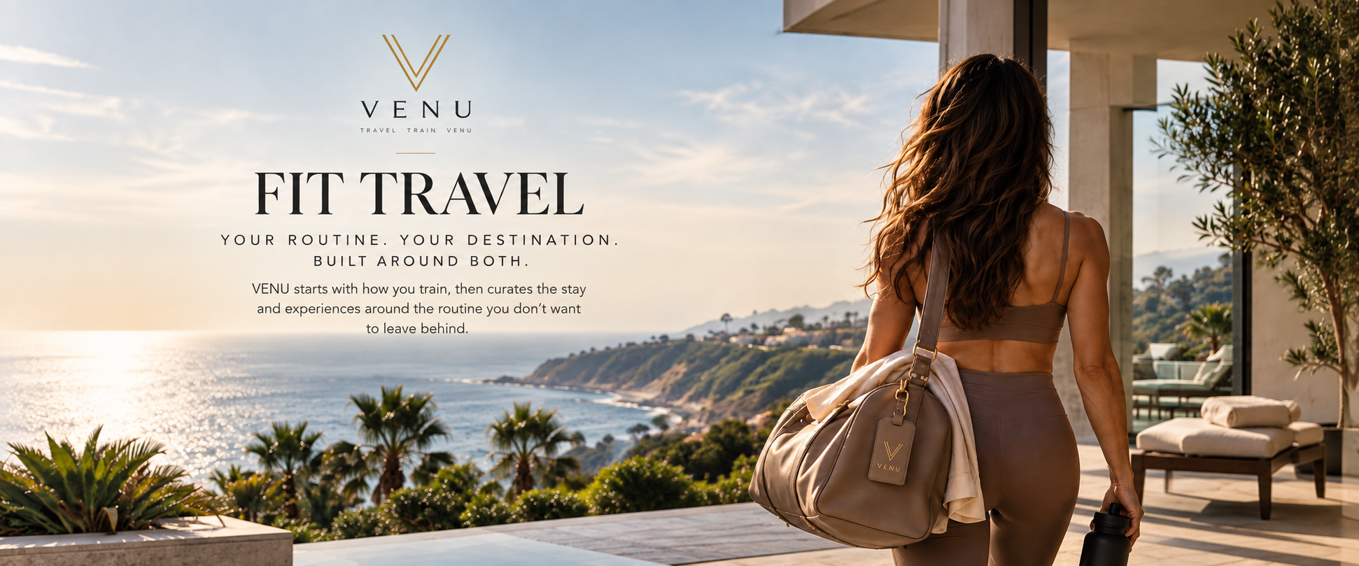 A woman with long, wavy hair carrying a beige duffel bag and a black water bottle stands on a patio overlooking a scenic coastal landscape at sunset, with a modern house and lush greenery around.