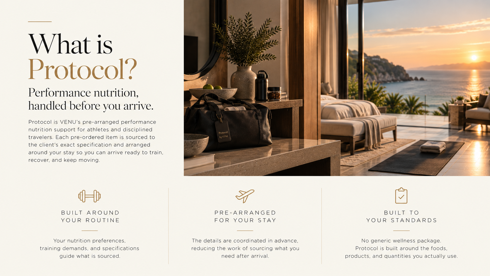 A luxurious hotel room with a large window overlooking the ocean at sunset. The room features a bed with white linens, a sitting area with chairs, and a balcony with outdoor furniture. Inside, there is a table with a plant, a black bag, and various items.