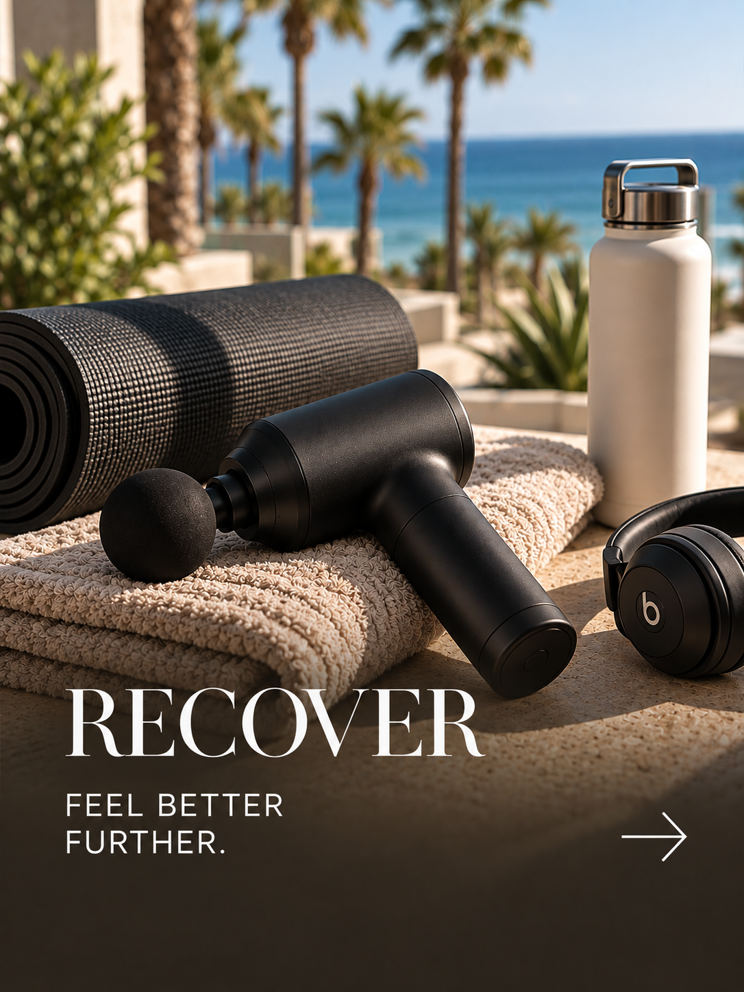 Yoga mat, massage gun, water bottle, headphones, and towel on a table outdoors near palm trees and ocean.