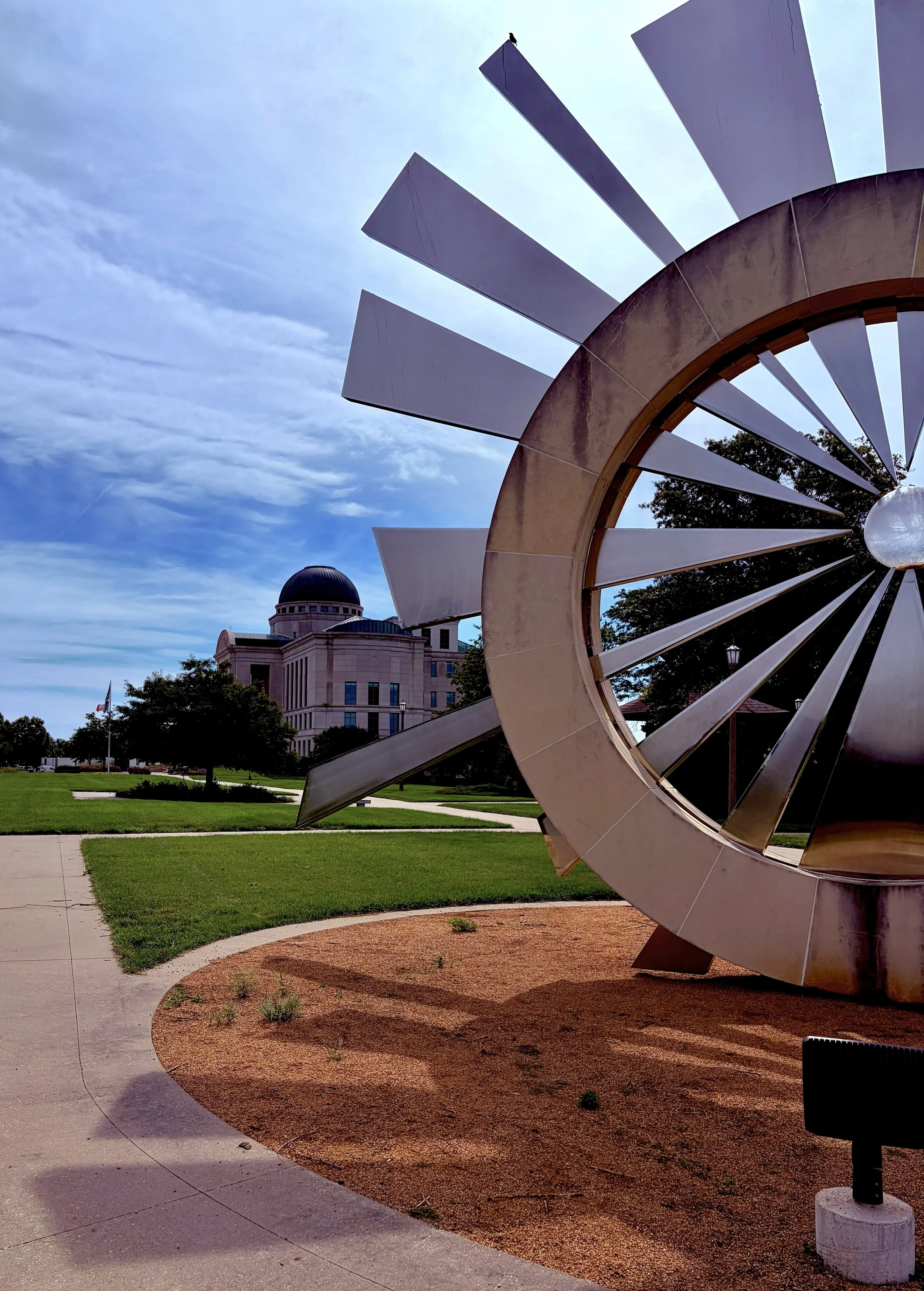 Facing Iowa Judicial Building from Shattering Silence sculpture.