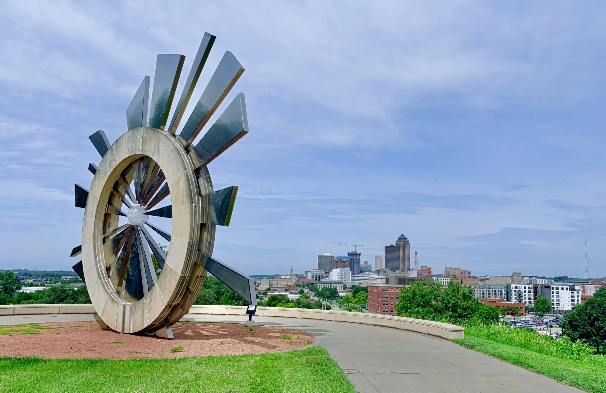 Shattering Silence sculpture at Iowa Judicial Building overlooking downtown Des Moines.