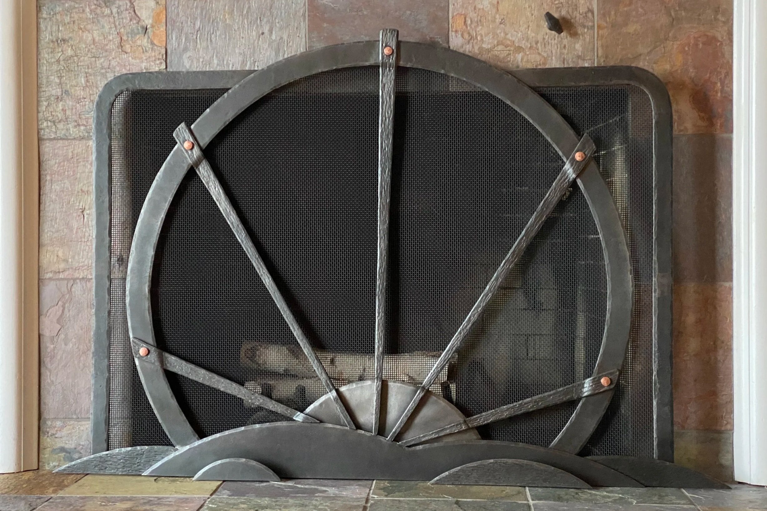 Custom Decorative Fireplace Screen – Handcrafted by Red Iron Studio, this custom forged steel fireplace screen showcases exceptional artisan craftsmanship with a unique architectural design. Built to enhance both safety and style, each custom firepla