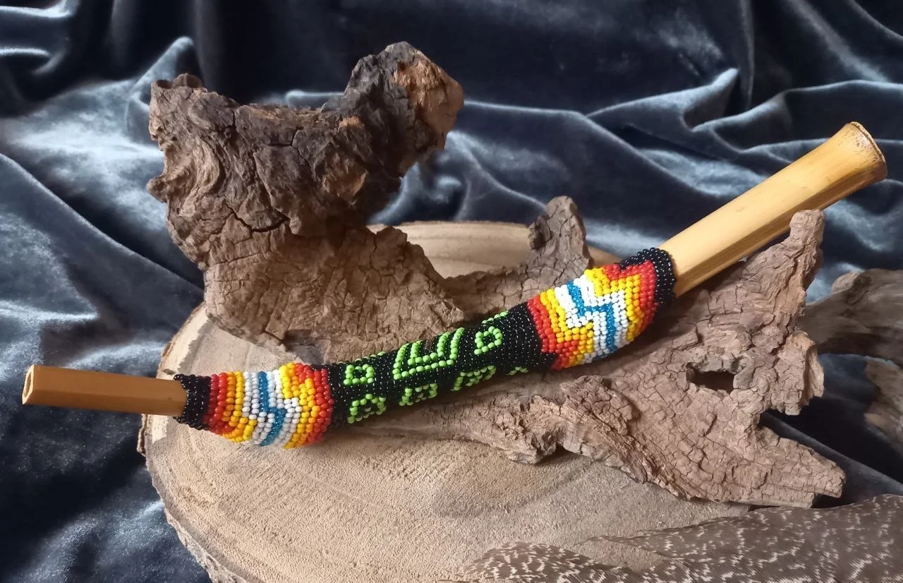 Handcrafted wooden tepi from jungle applicator for rapé ceremonies. Smooth airflow, ergonomic design, and natural materials for sacred ritual use.