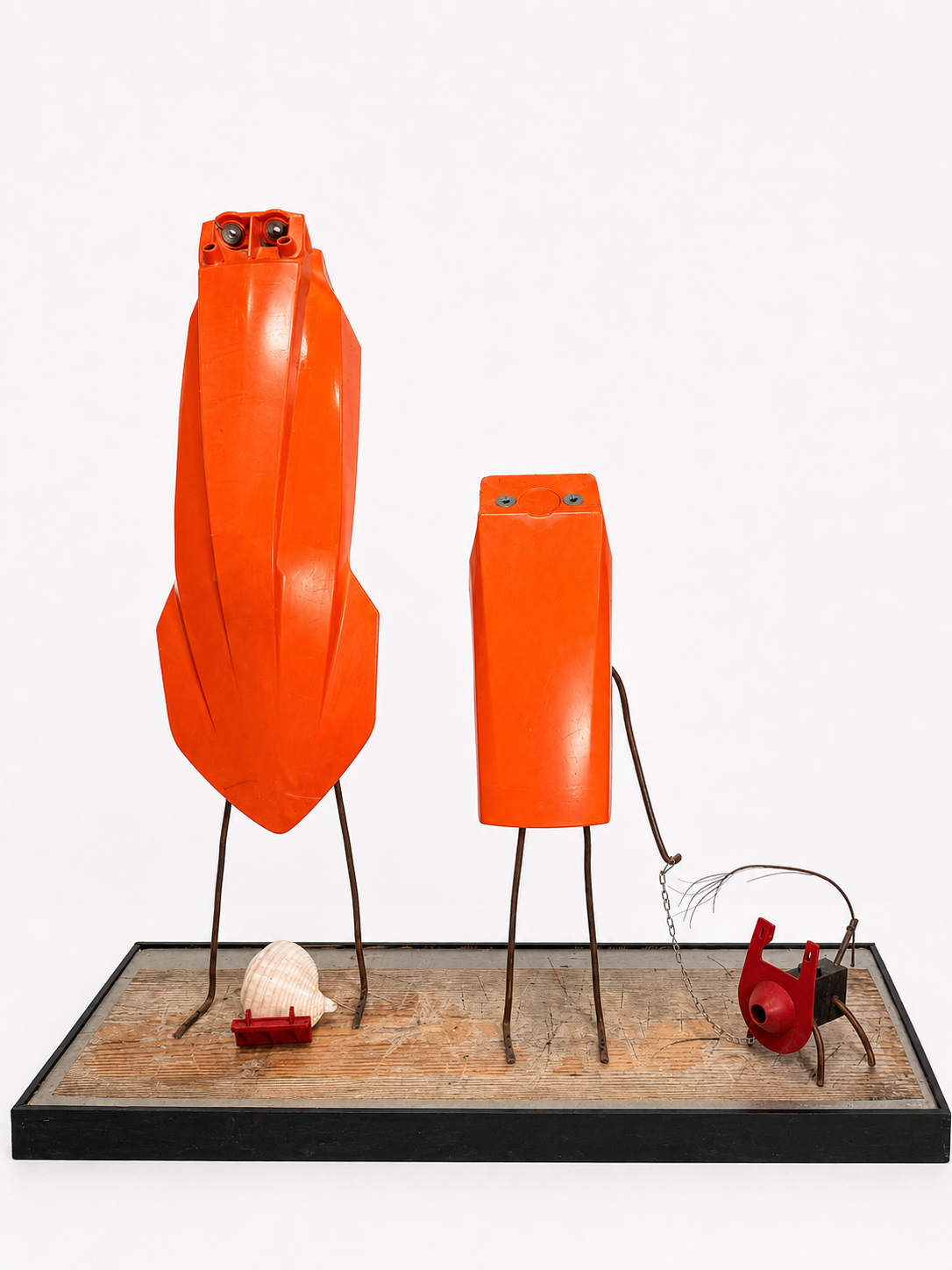 Family Portrait / 2024 / Materials: Motorcycle parts, toilet parts, seashell, copper tubing, found wood base