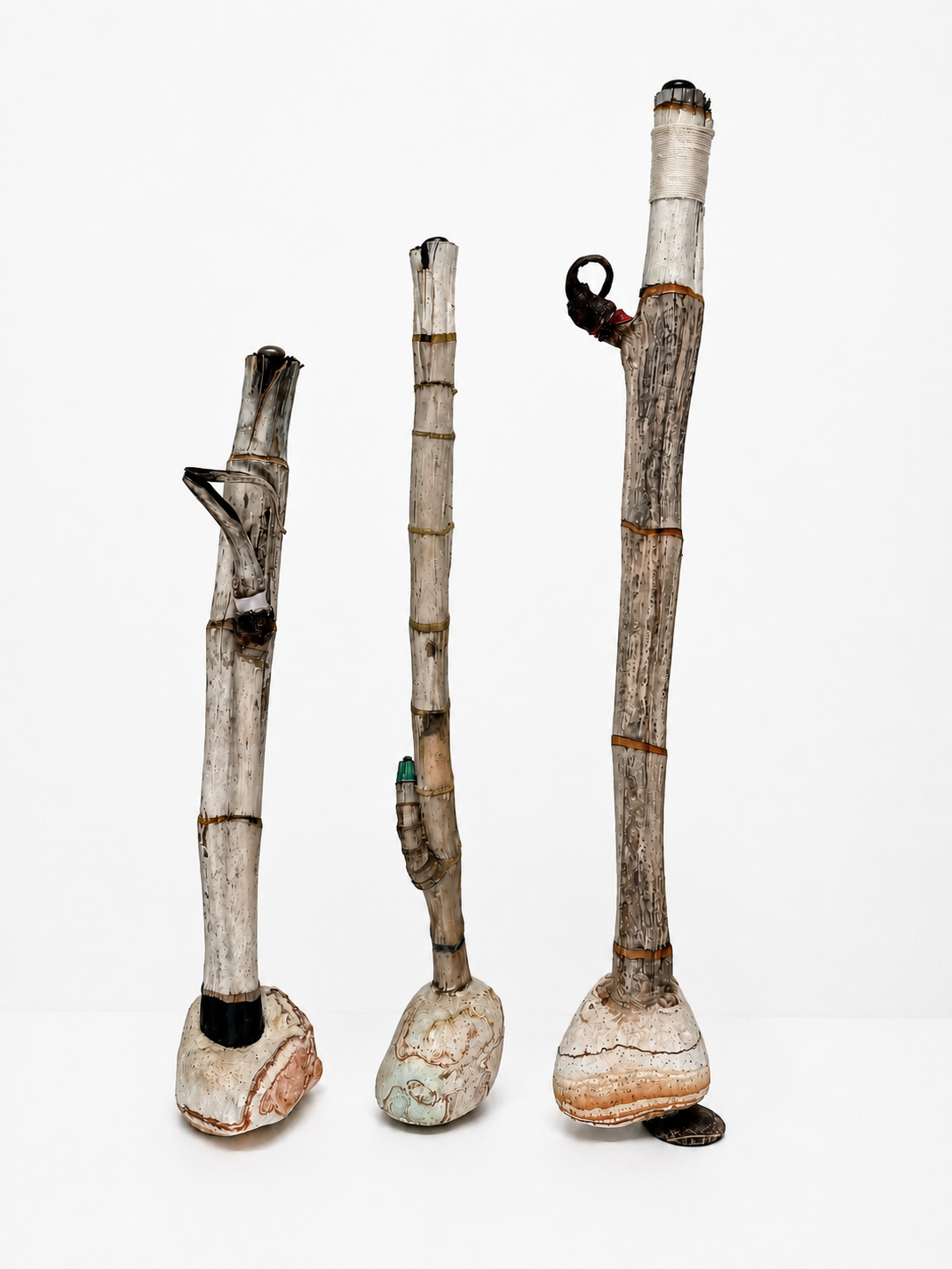 The Three Musketeers / 2025 / Materials: Found rocks, palm tree trunk, paint