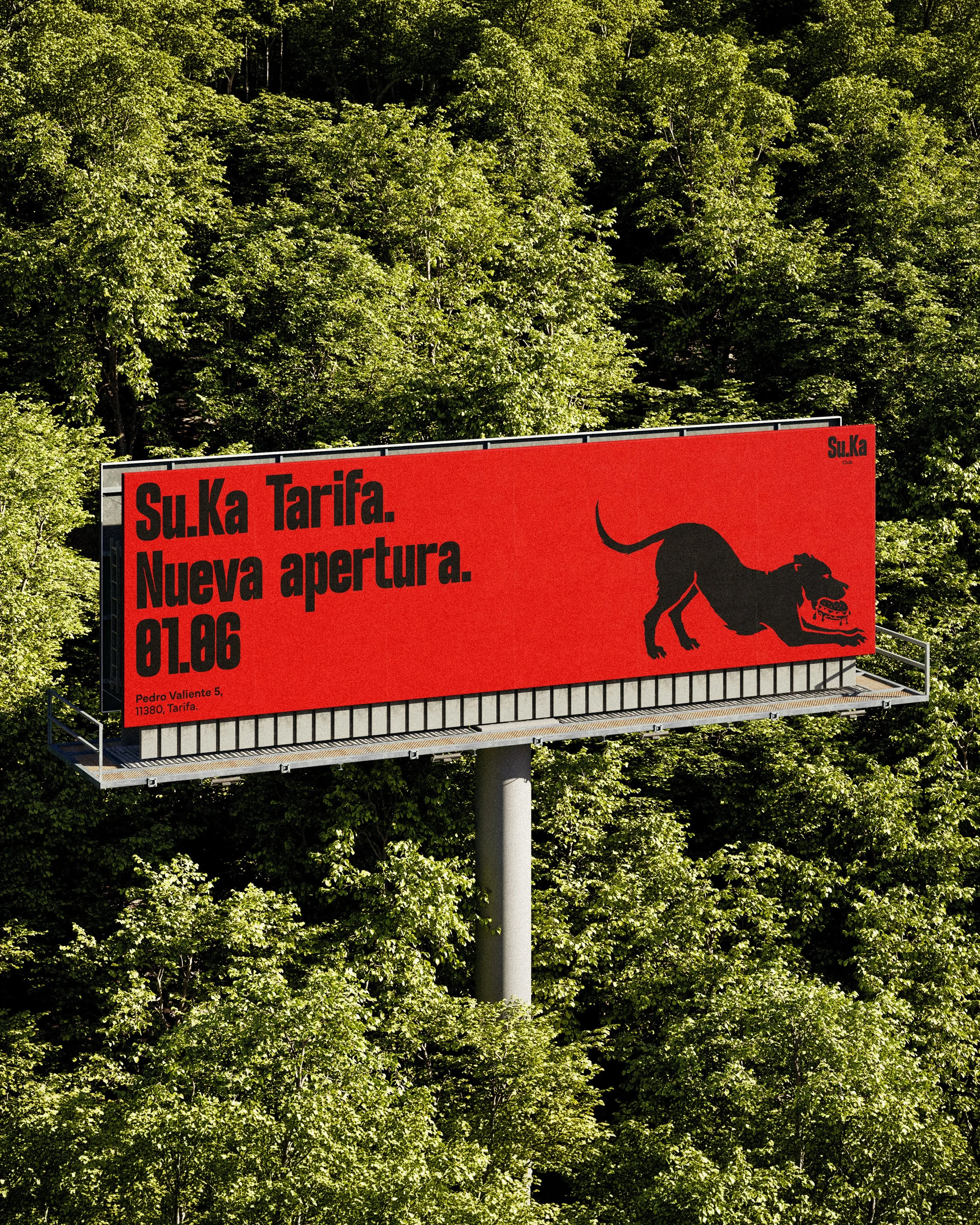 A large red billboard with black text and a silhouette of a German shepherd dog, set against a background of dense green trees.