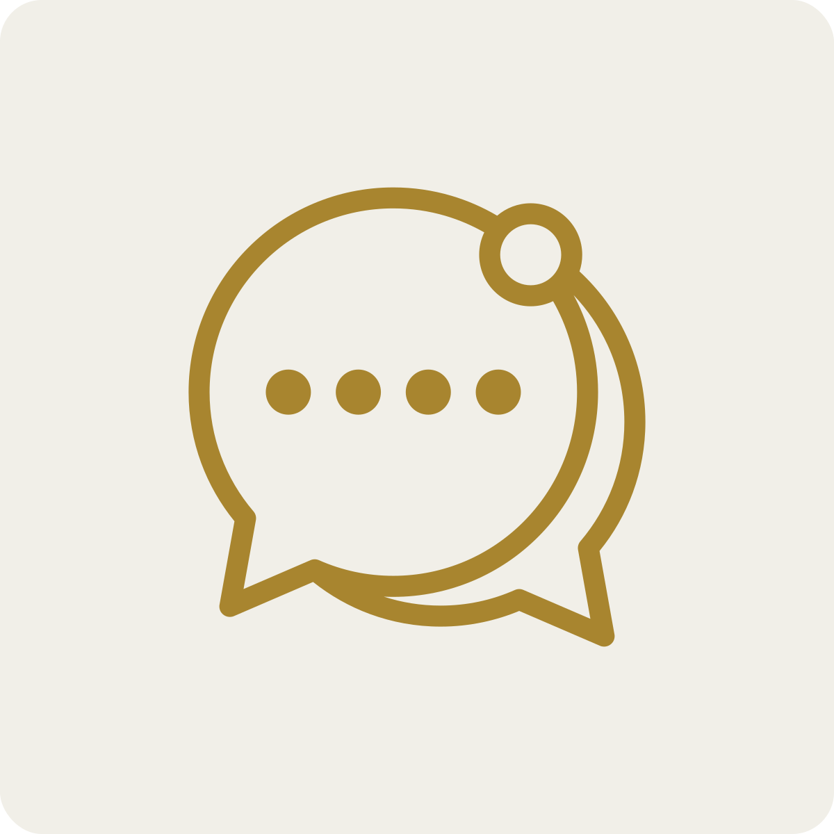 Outline icon of a speech bubble with three dots, connected to a smaller circle at the top right, all in gold color on a light background.