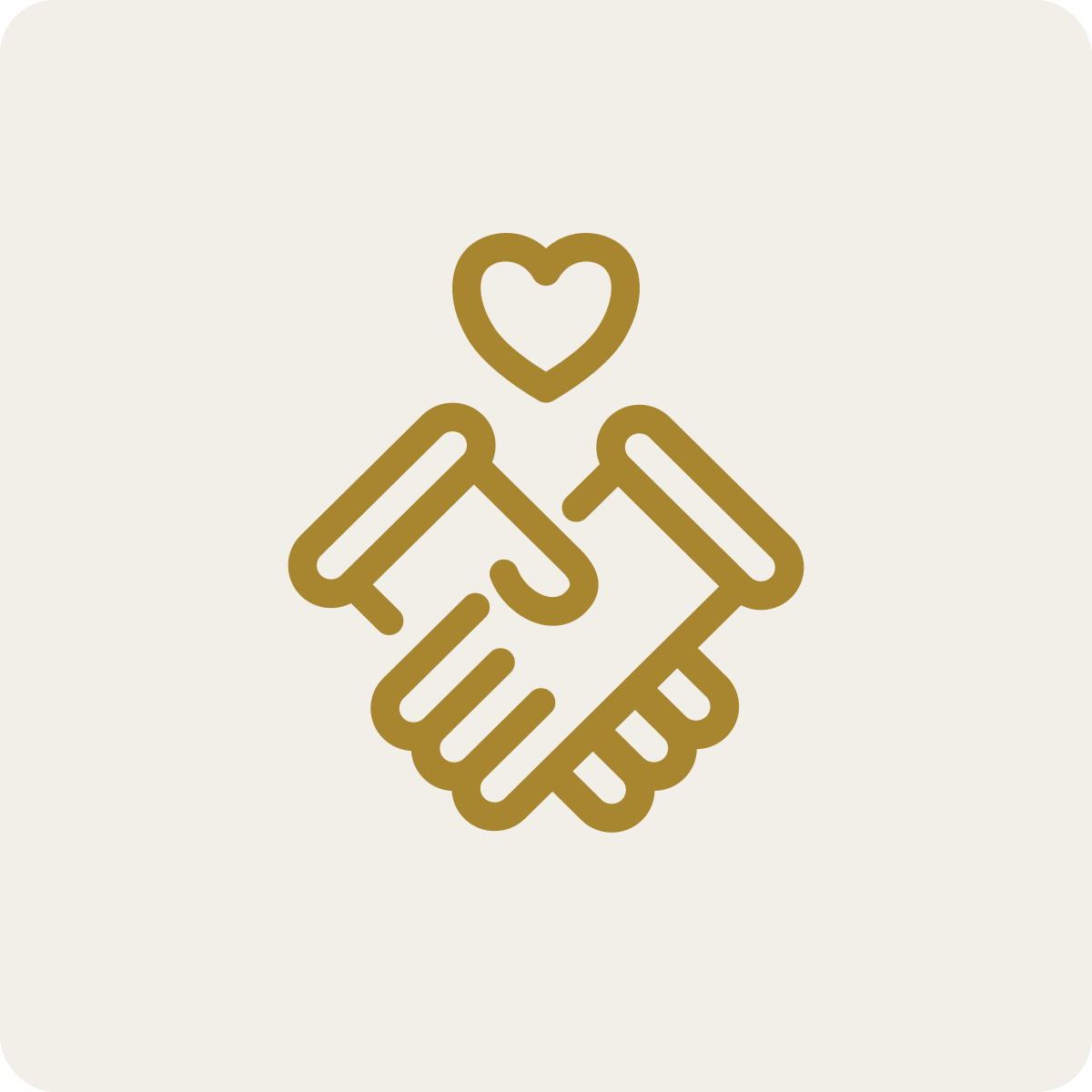 Gold outline of two hands shaking with a heart above them on a light background.