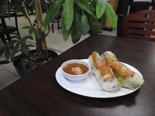 Image of egg spring rolls and sauce