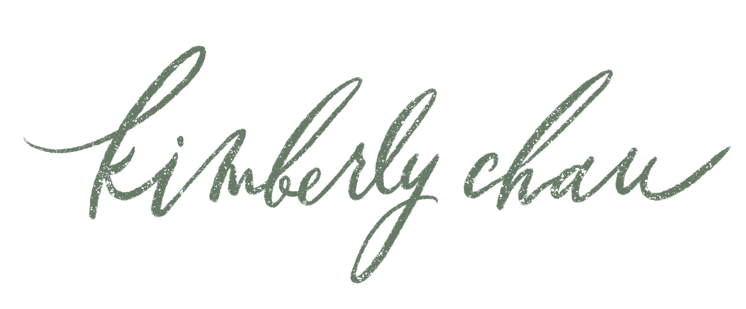 Handwritten calligraphy reading 'kimberly chau' with a distressed texture