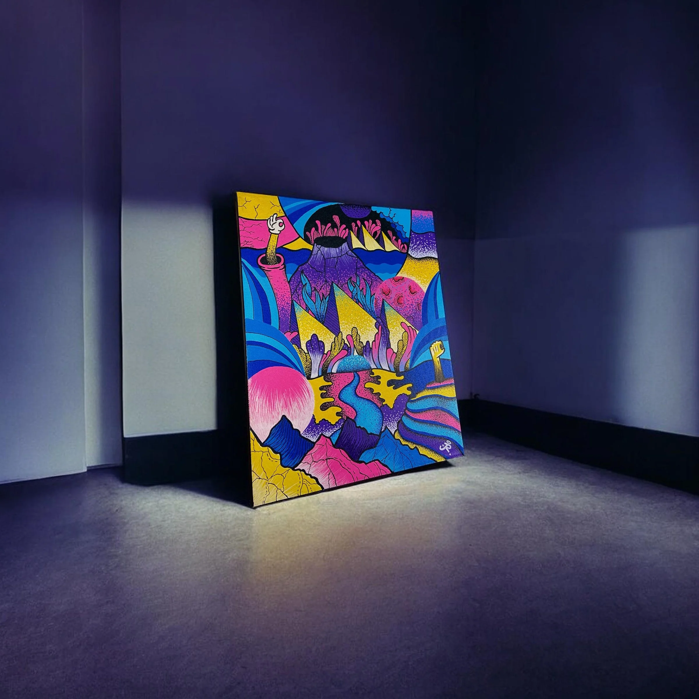 Colorful abstract painting leaning against a dark purple wall in a gallery with gray flooring.