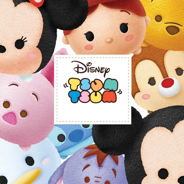 Disney Tsum Tsum plush toys featuring popular characters surrounding a logo with colorful letters spelling 'Tsum Tsum' in the center.