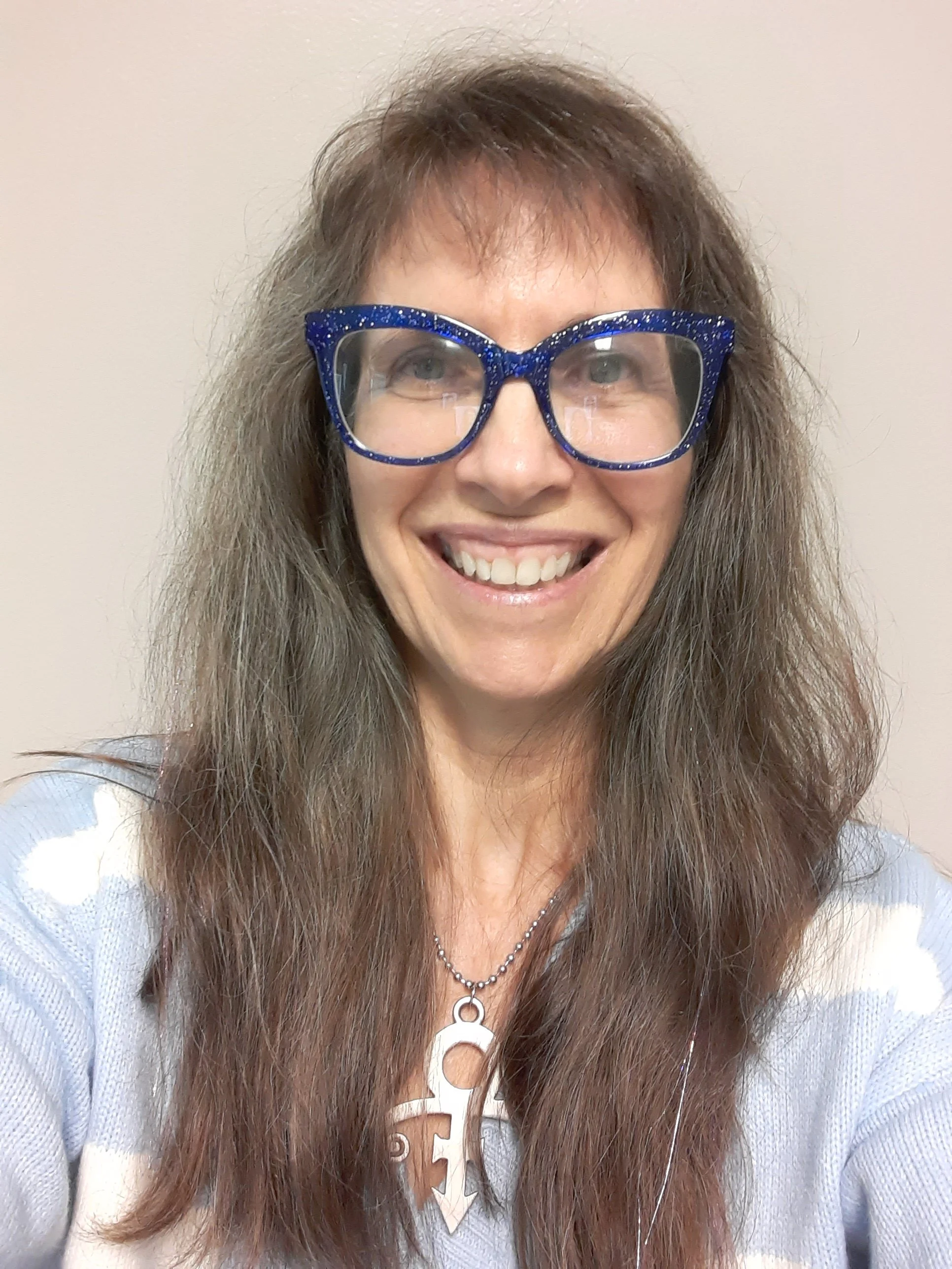 Headshot of woman smiling at camera
