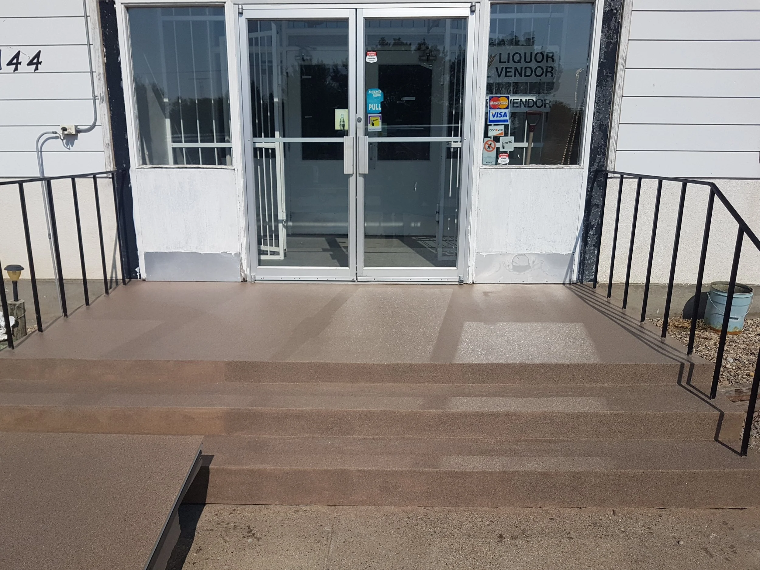 AFTER - Finished in Toffee Anti-Slip Quartz Stone.
