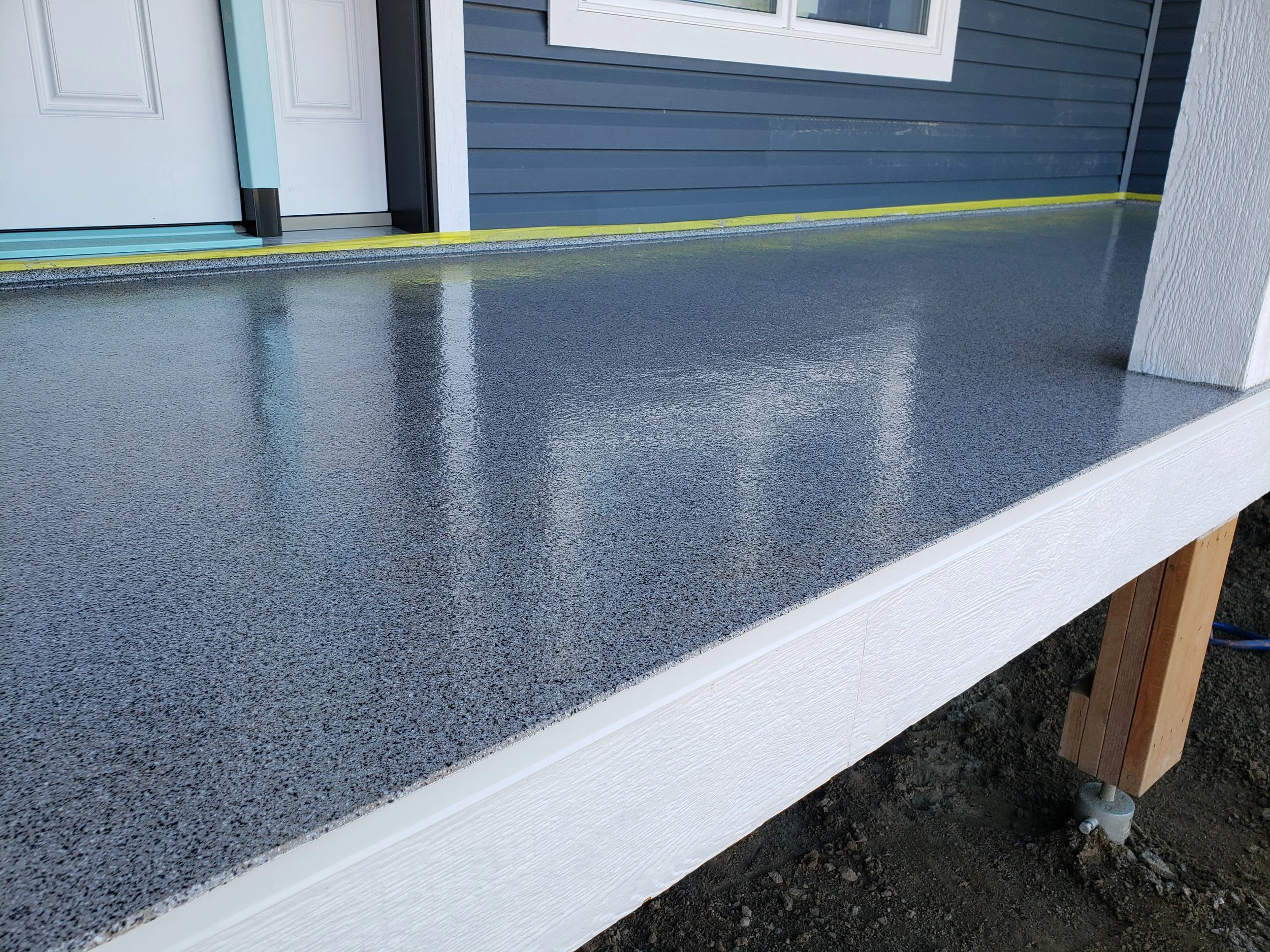 full flake broadcast polyaspartic coated front deck.