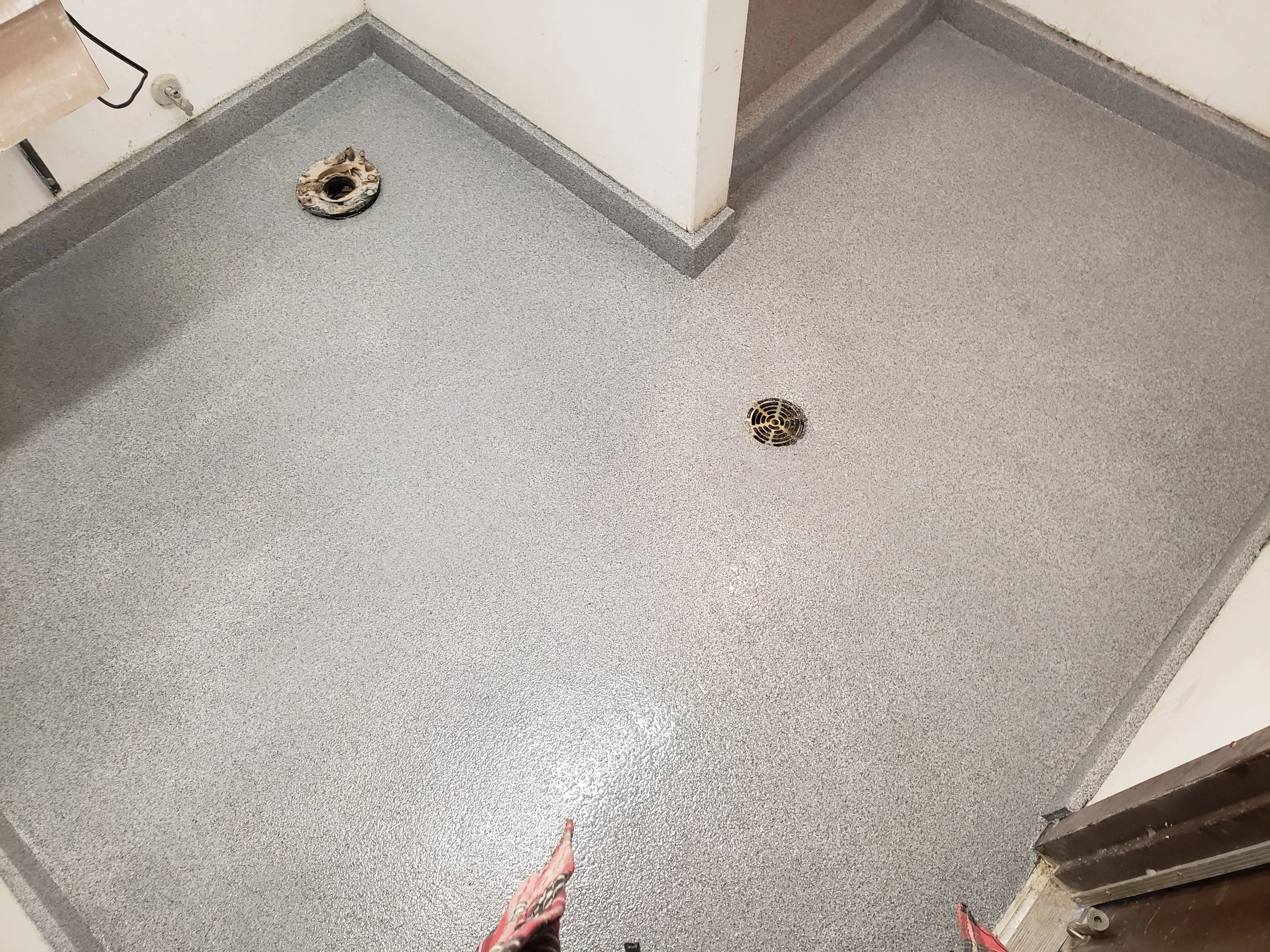 Finished in Dalmatian Anti-Slip Quartz Stone.