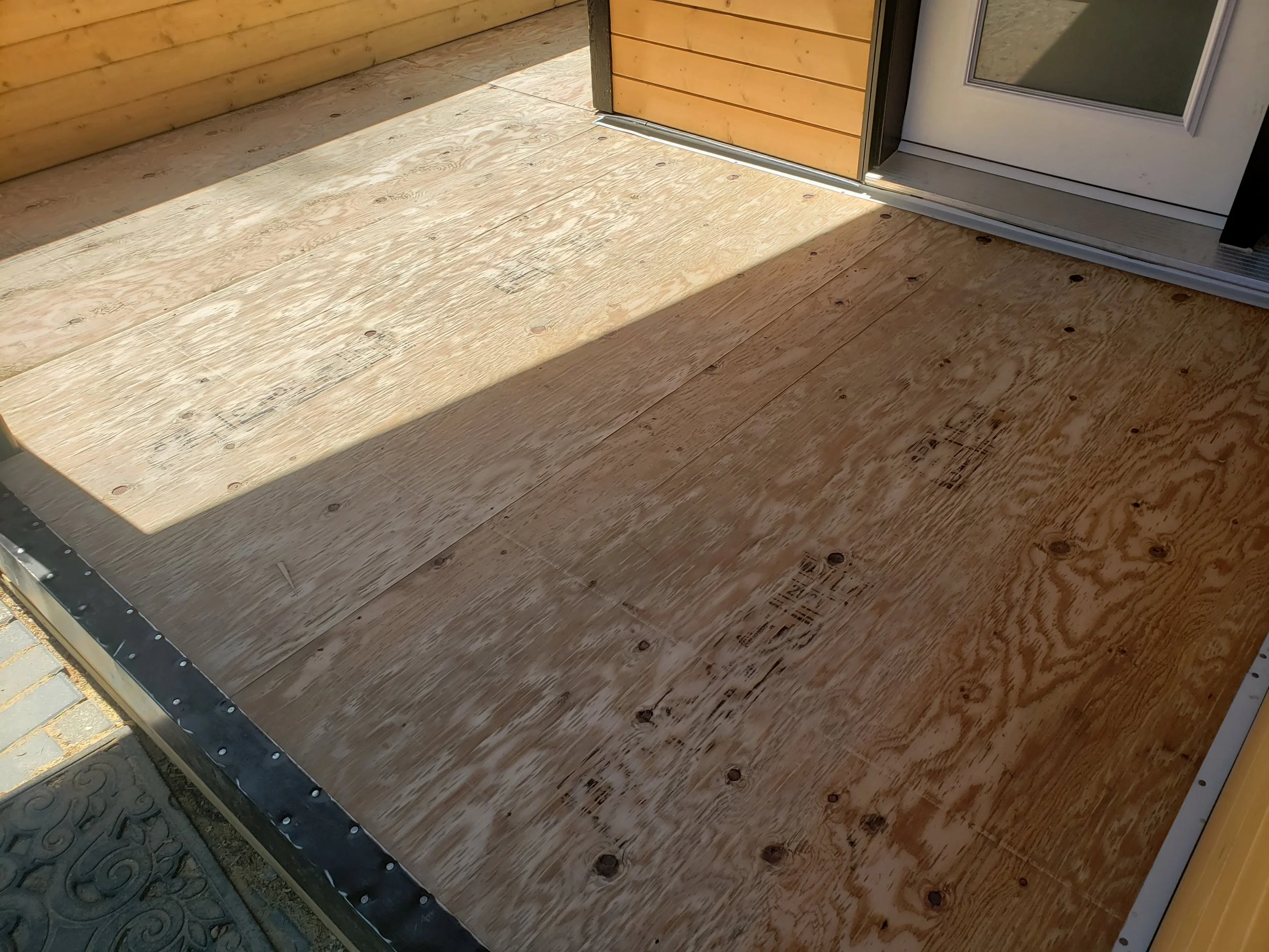 Unfinished front porch area. 