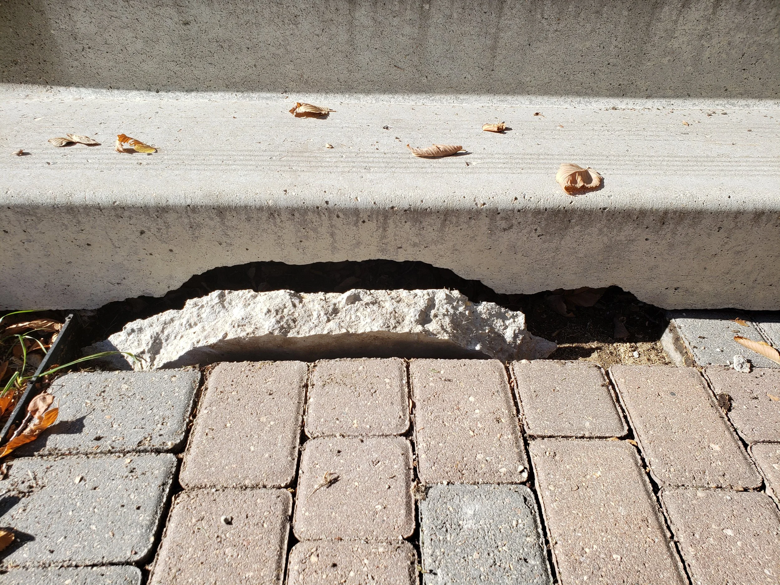 BEFORE - Large cracks and damage.
