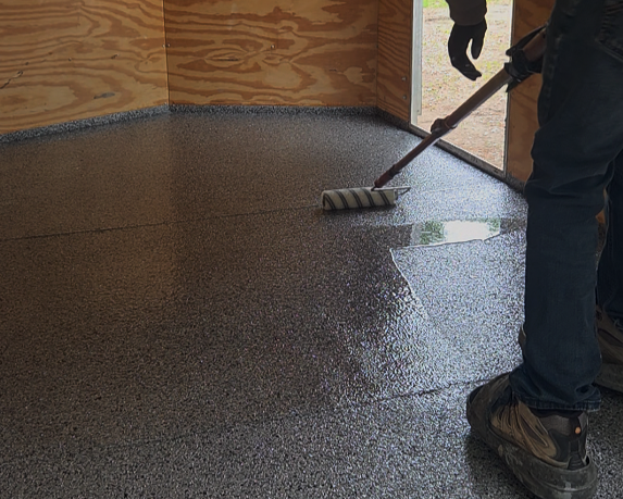 Rolling clear sealing coat.