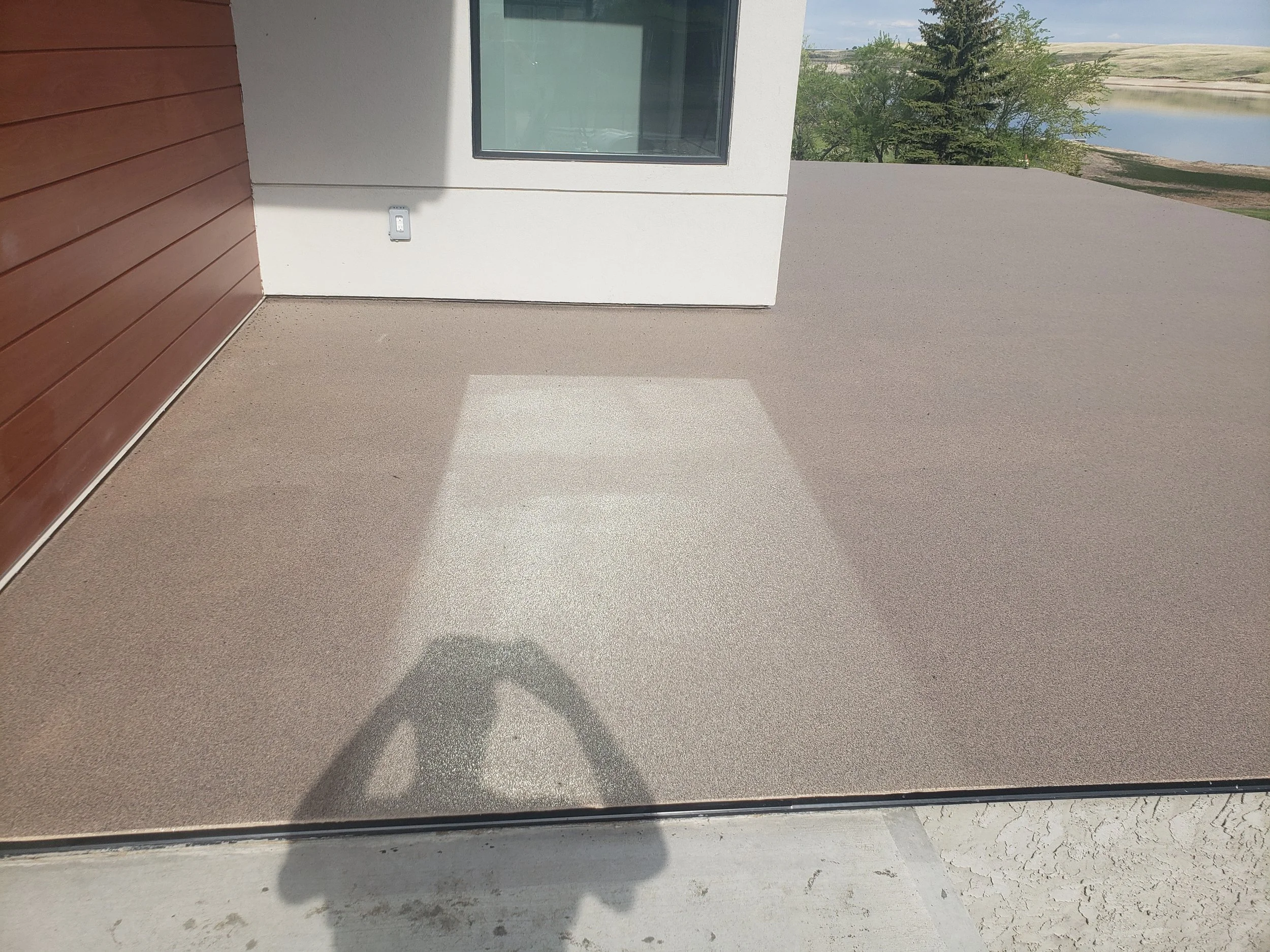 AFTER - Finished in Toffee Anti-Slip Quartz Stone.