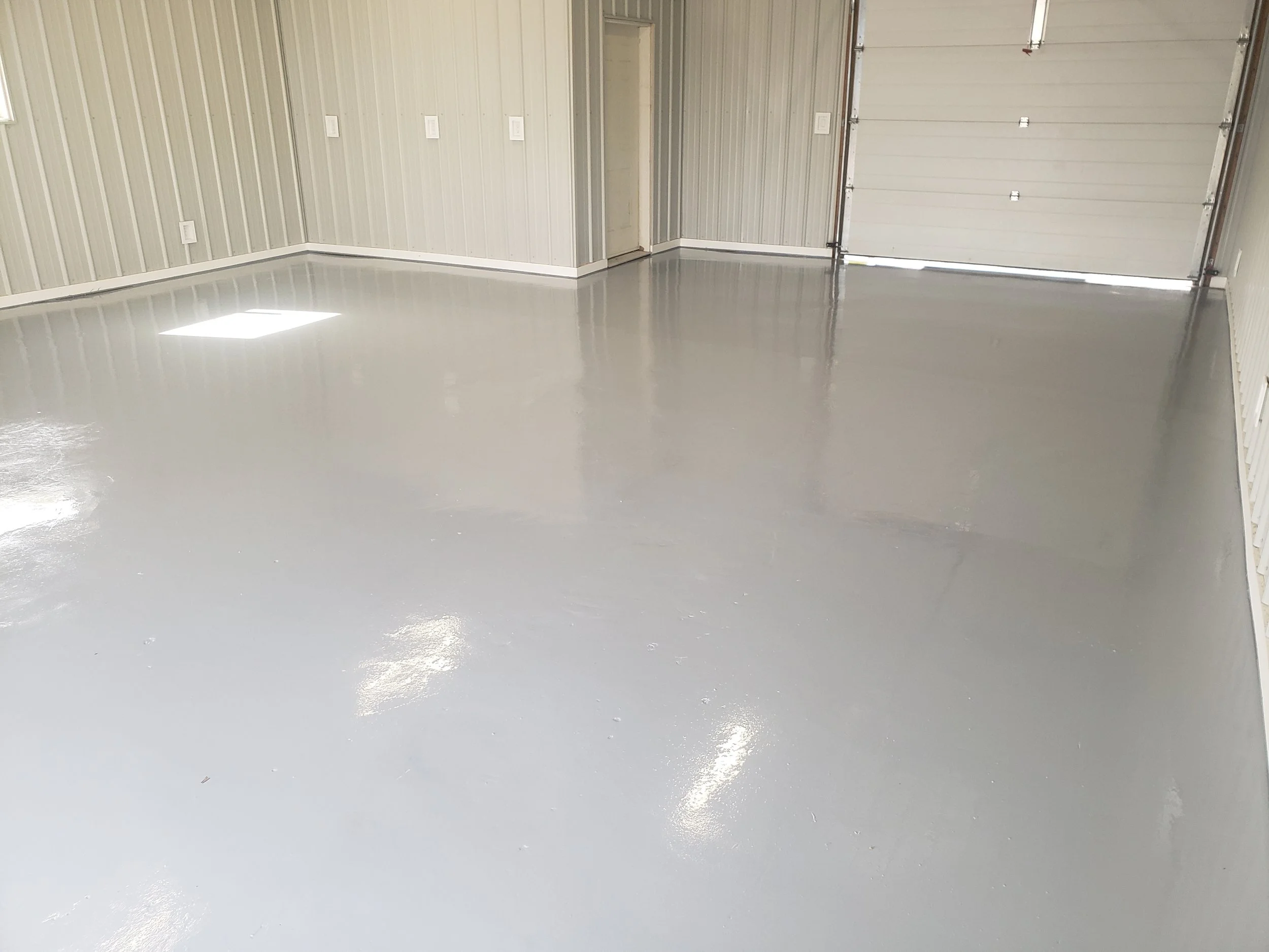 solid base grey polyaspartic shop floor.