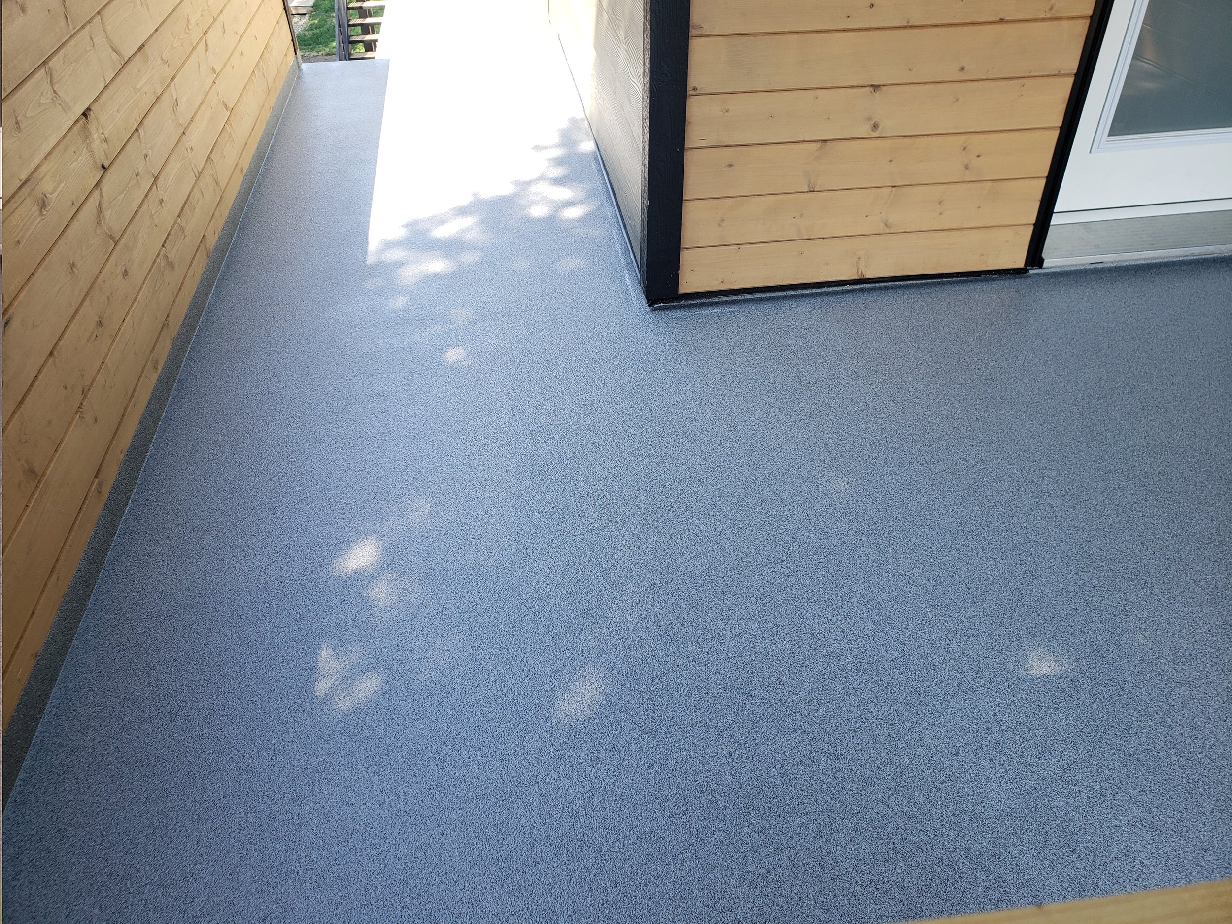Polyaspartic coated front porch area. 