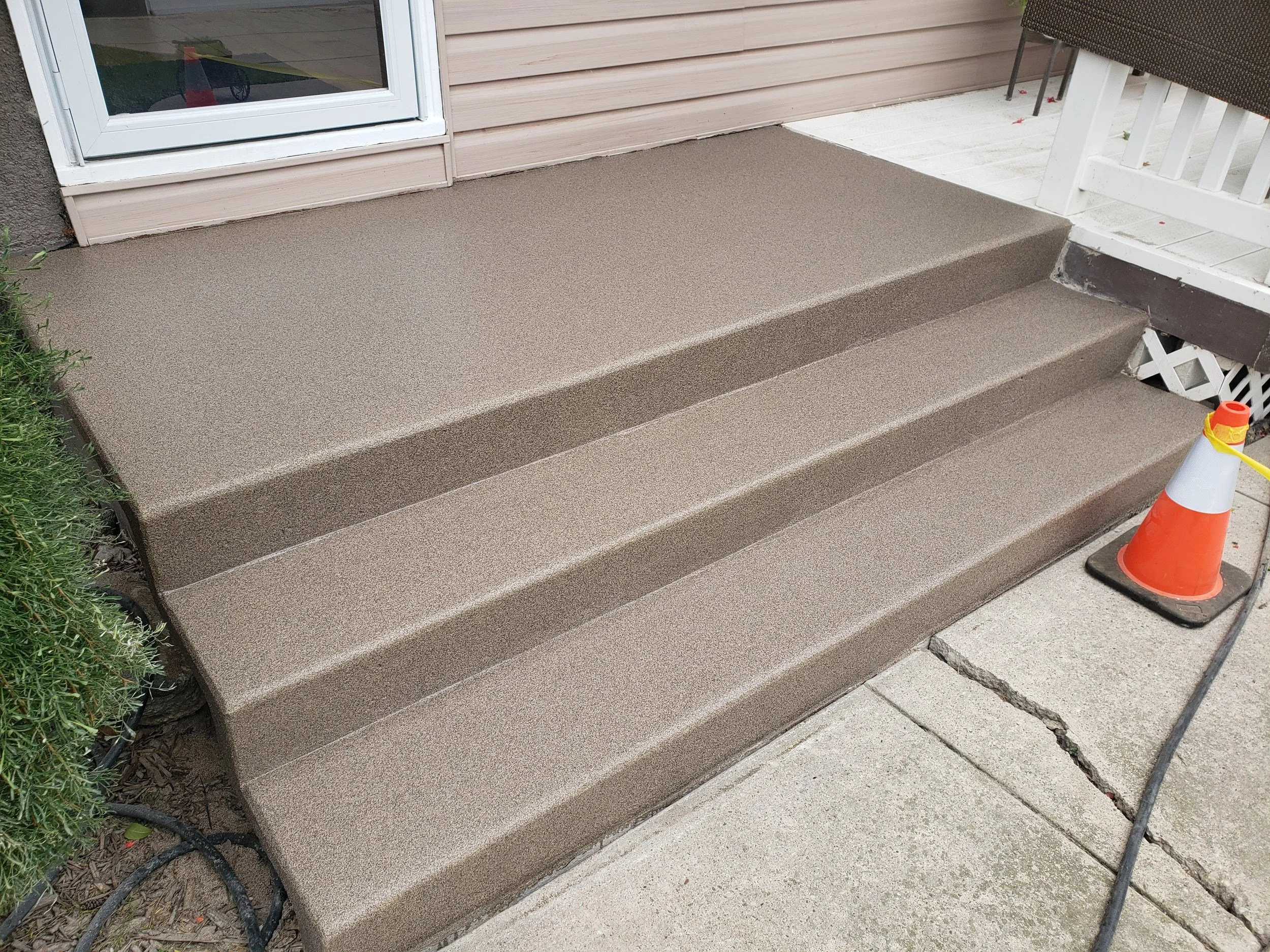 AFTER - Finished in Toffee Anti-Slip Quartz Stone.