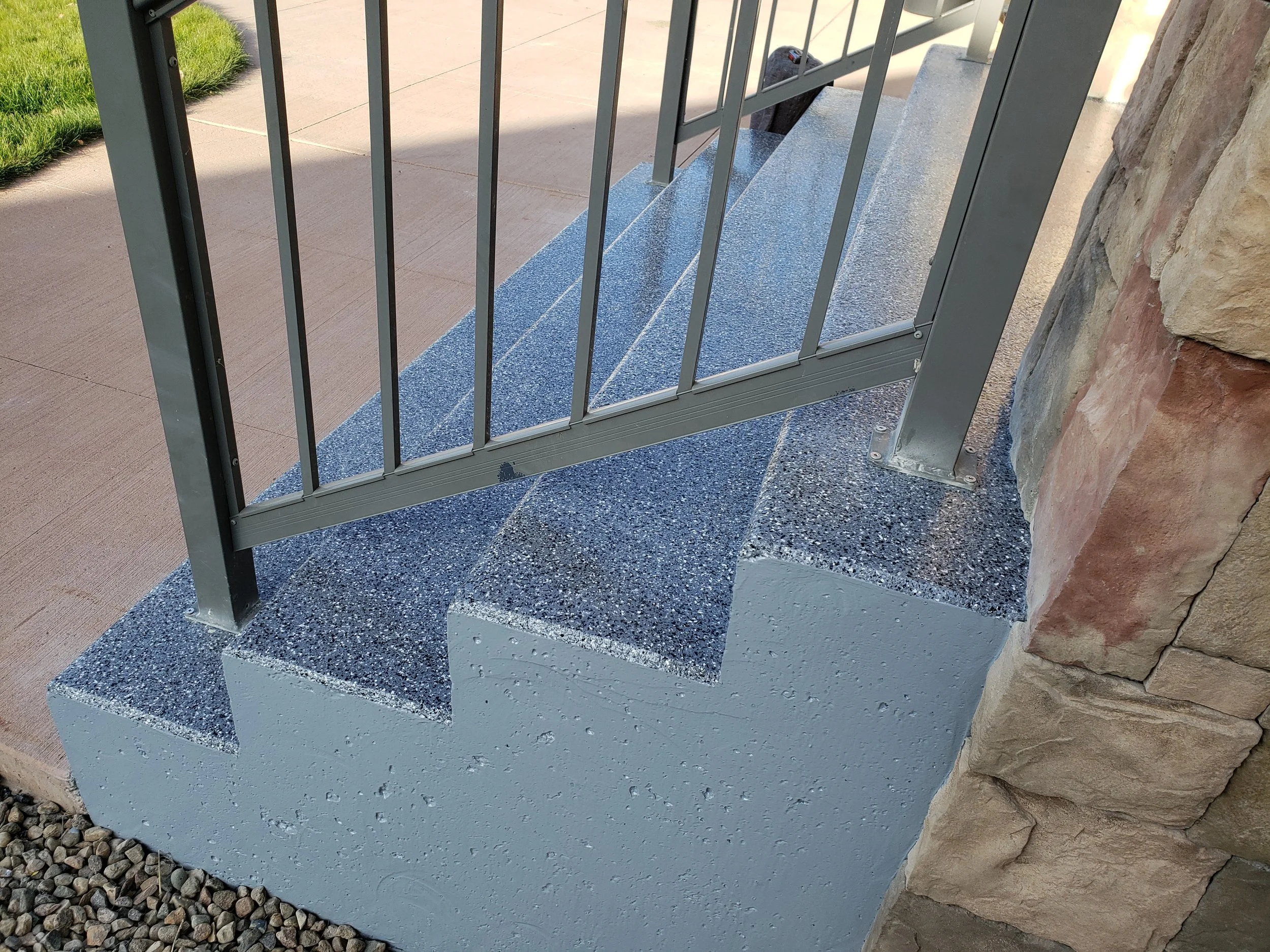 AFTER - Finished in Charcoal 1/4" Full Flake Broadcast.