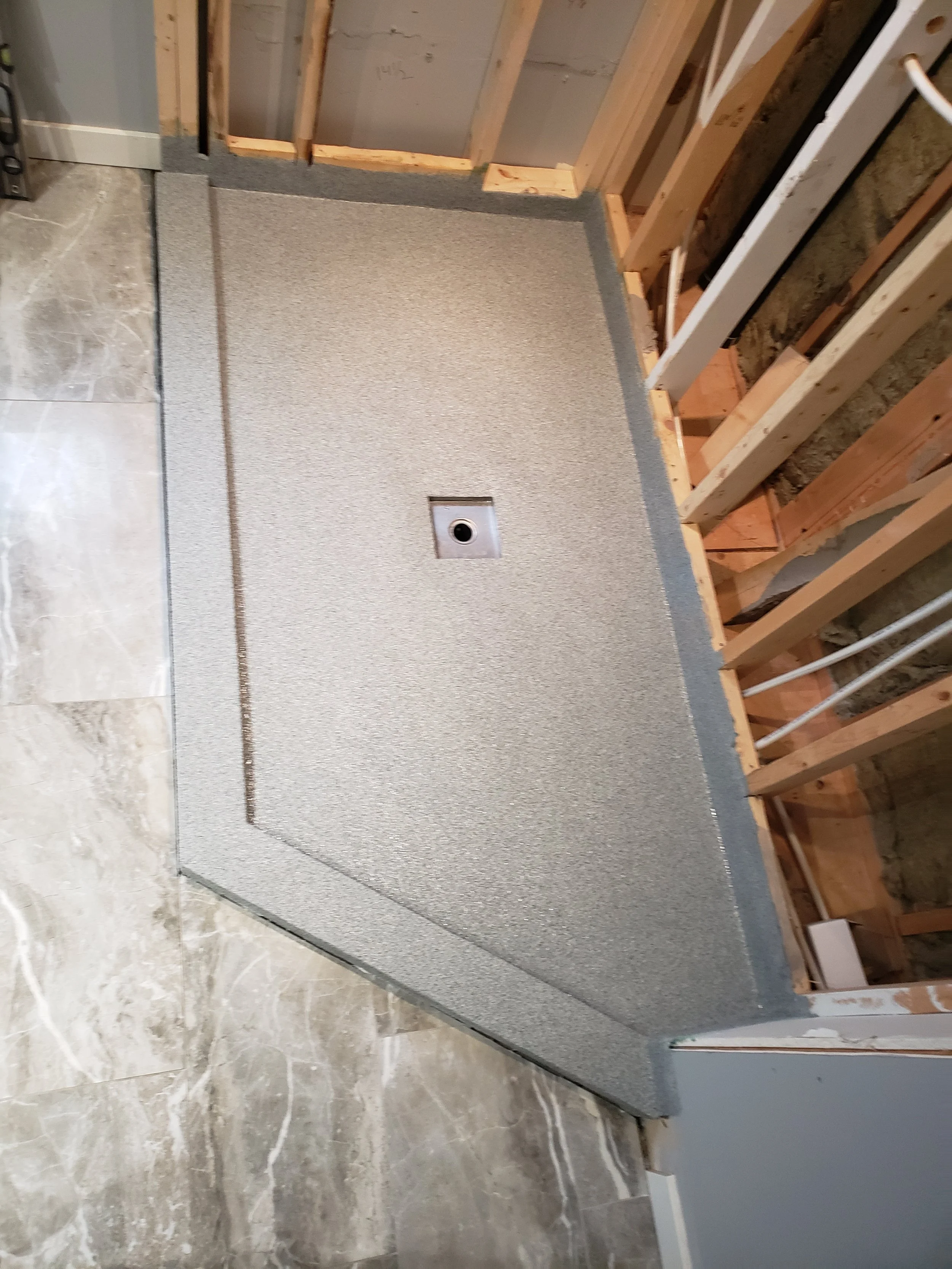 Finished in Pepper Frost Anti-Slip Quartz Stone.